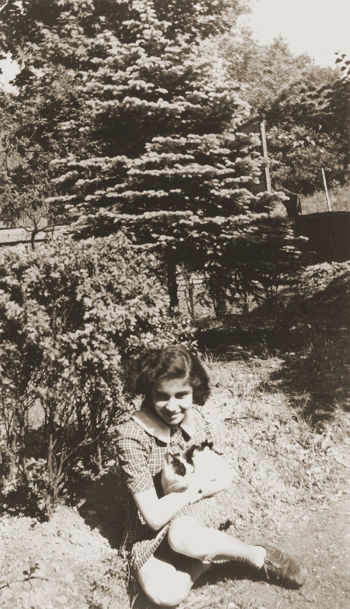Snapshot of thirteen-year-old Ditta Bretholz, which she sent to her brother Leo in France on the occasion of his twenty-first birthday.  

This photo, which was sent via a cousin in Switzerland, was to be his last picture of Ditta before she was killed.  
The inscription on the back of the photo reads, "With my best wishes for luck on your birthday from your sister who always thinks of you."  The picture was sent to Leo in France via a cousin in Switzerland.