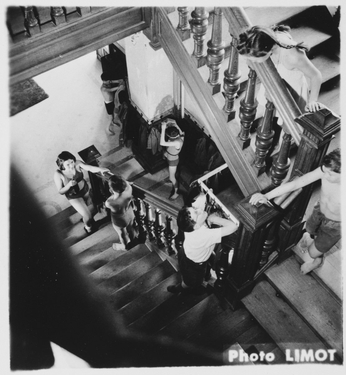 Children walk up the stairwell of the Mehoncourt children's home.