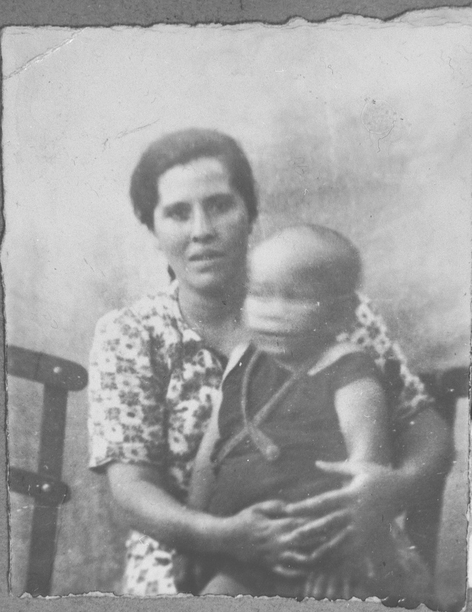 Portrait of Luna Ischach, wife of Avram Ischach, with baby.  She lived at Bistritska 9 in Bitola.