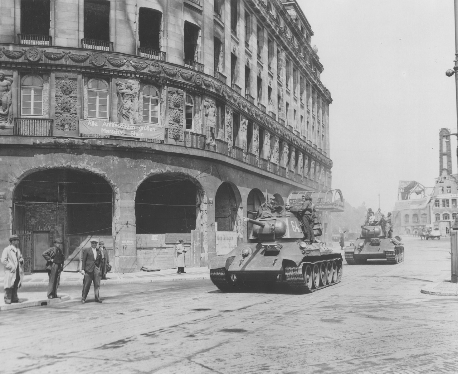 Red Army tanks push through the streets of Leipzig during the Soviet advance through eastern Germany.