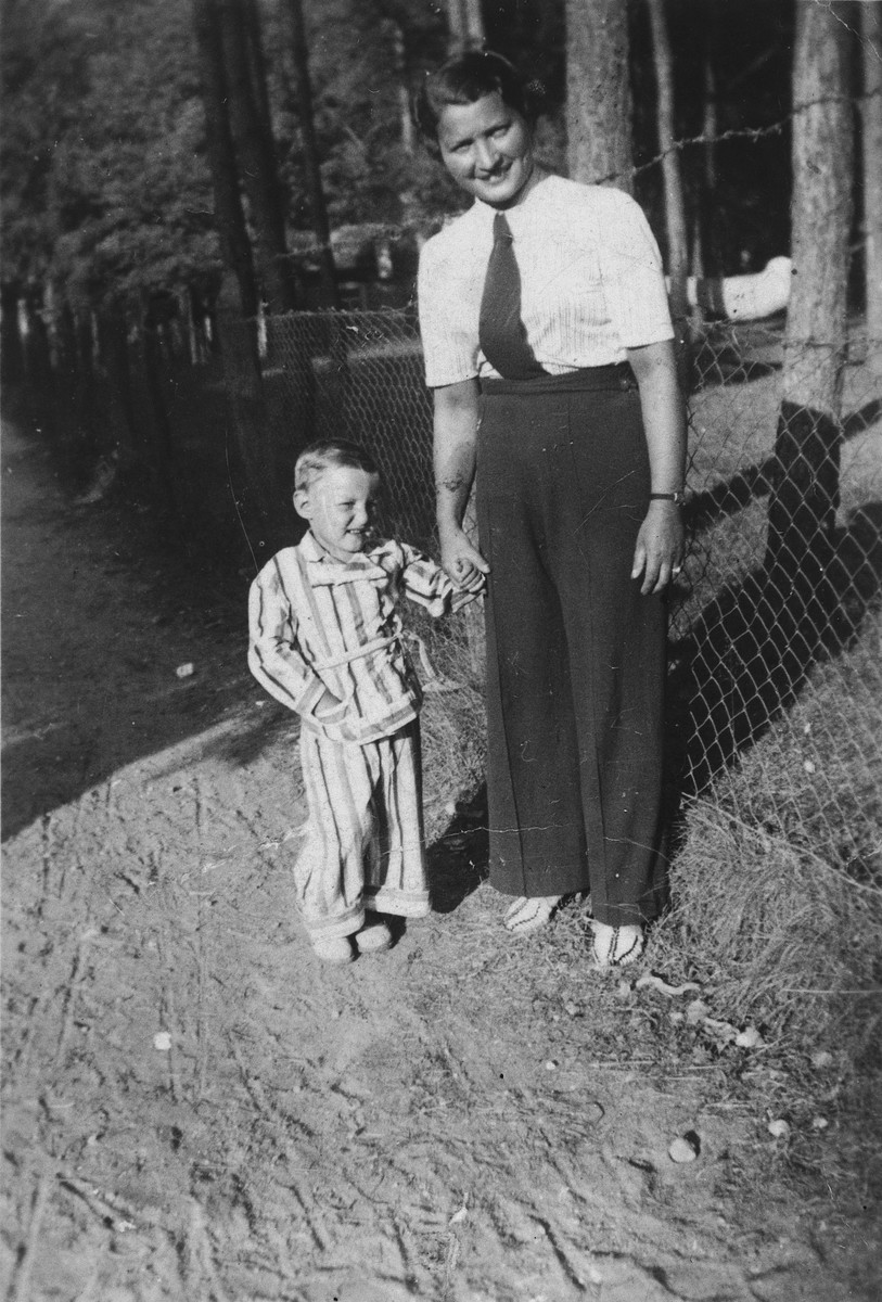 A young Jewish mother walks with her son in Kulautuva, Lithuania.

Pictured are Eta and Yacob Ipp.