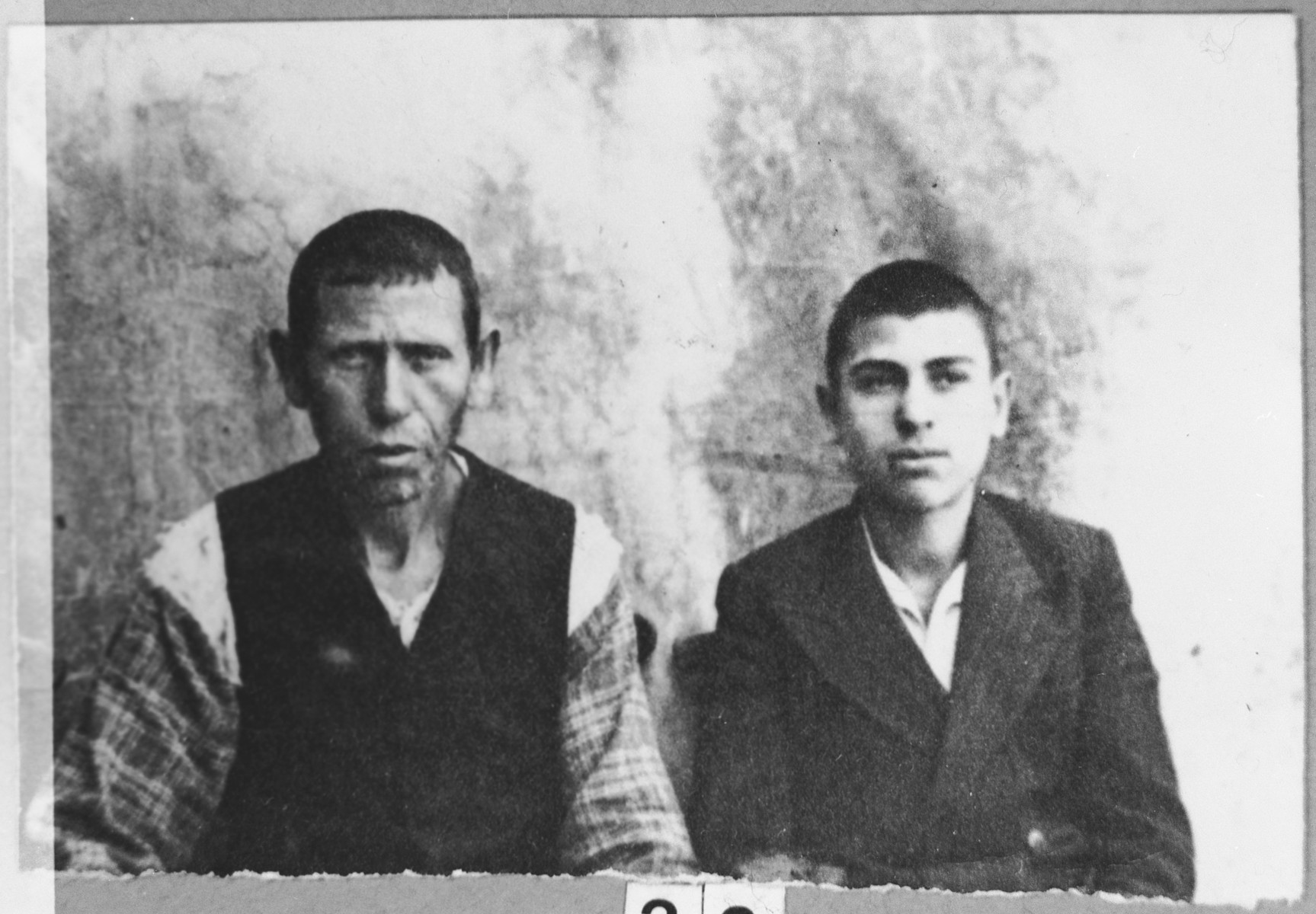 Portrait of Aron Albocher, son of Shabetai Albocher, and his son, Yakov.  Aron was a laborer and Yakov, a student.  They lived at Krstitsa 12 in Bitola.