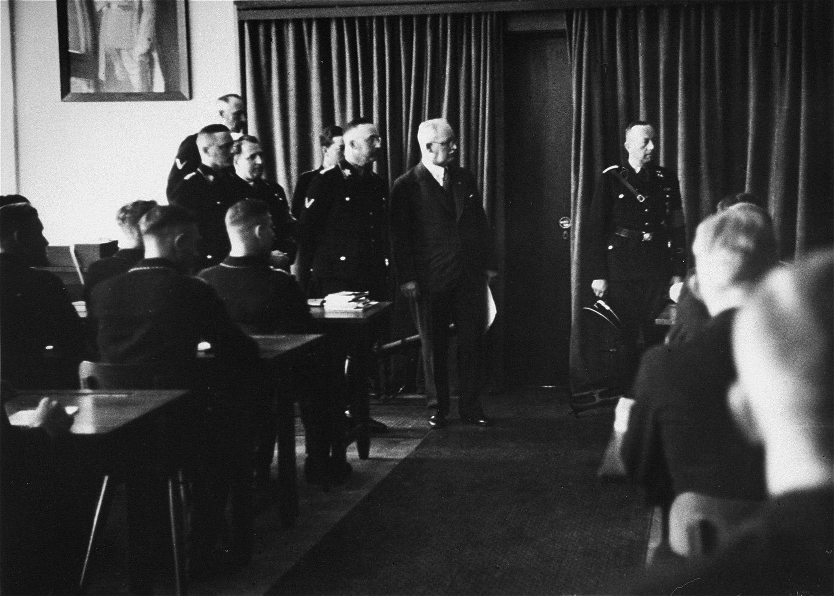 Heinrich Himmler gives a lecture to SS officers.  This image is from an album of SS photographs.