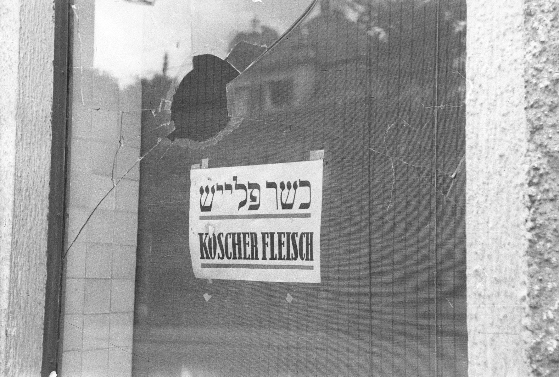 The vandalized display window of a kosher butcher shop located on the Ismaningerstrasse in Munich.