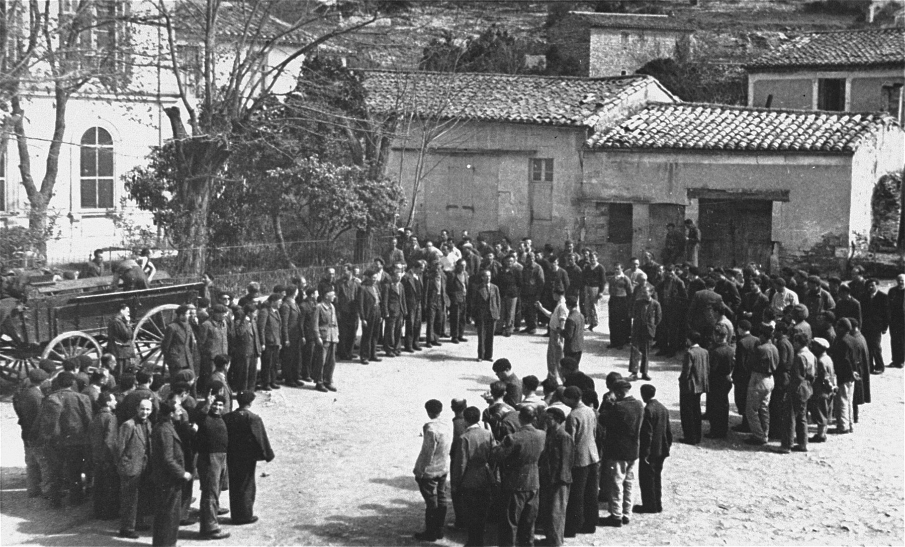 Roll call at the forced labor camp for Prestataires (foreign nationals drafted into a special branch of the French military).