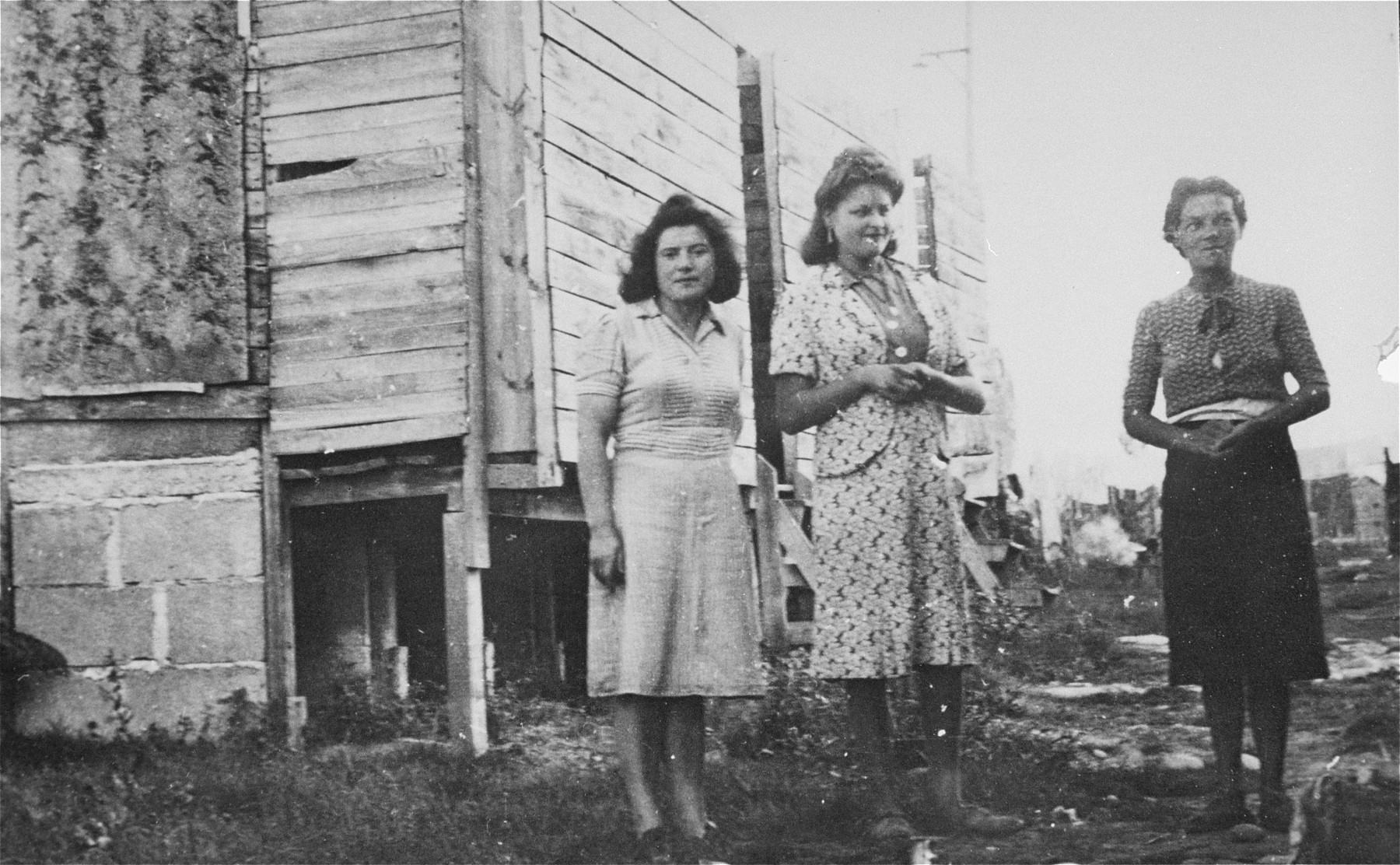 Women prisoners in Gurs wait to use the latrines.  This photograph was shot secretly by Alice Resch-Synnestvedt during her stay in Gurs as a delegate of the American Friends Service Committee.