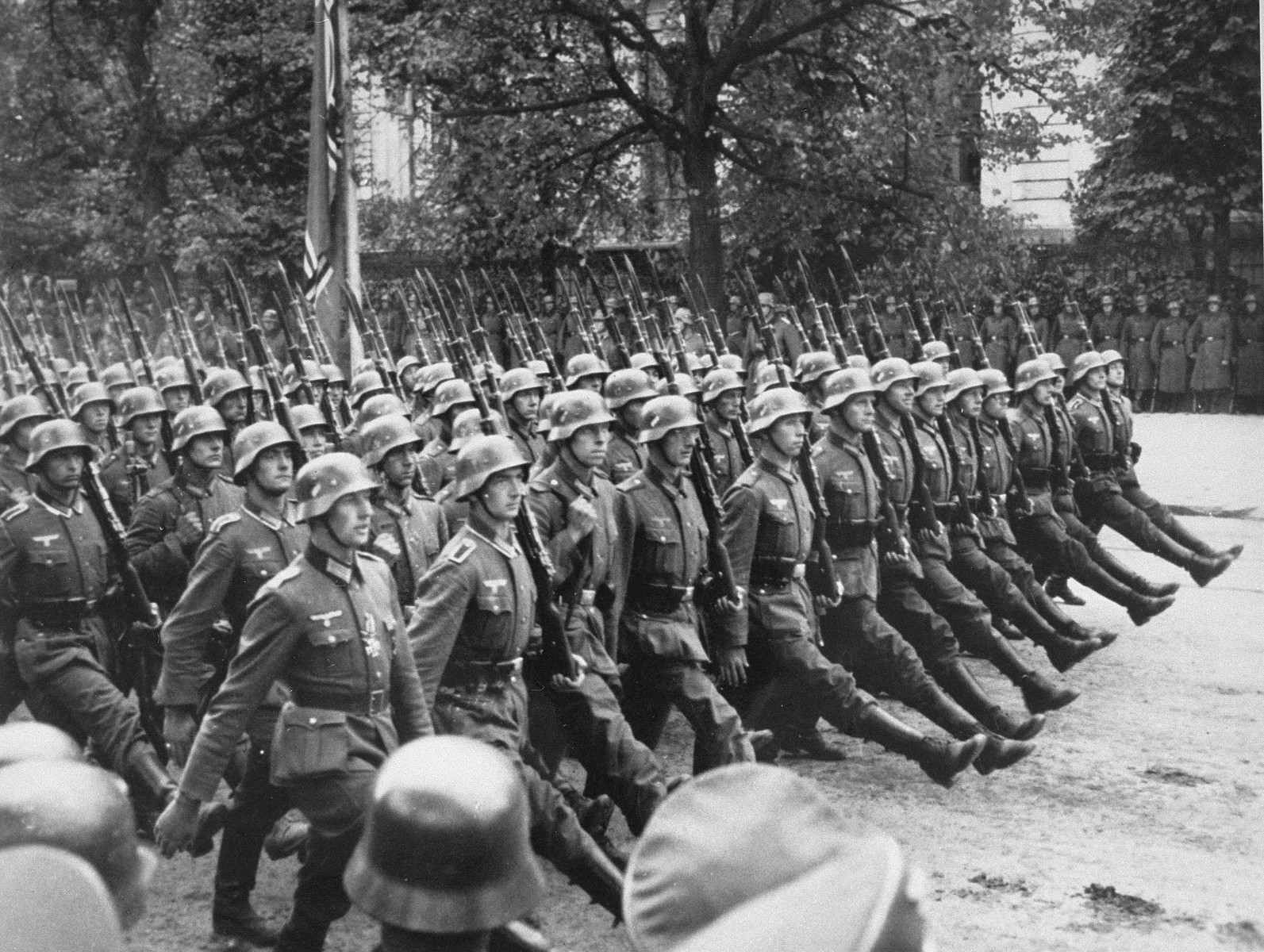 German soldiers parade through Warsaw to celebrate the conquest of Poland.