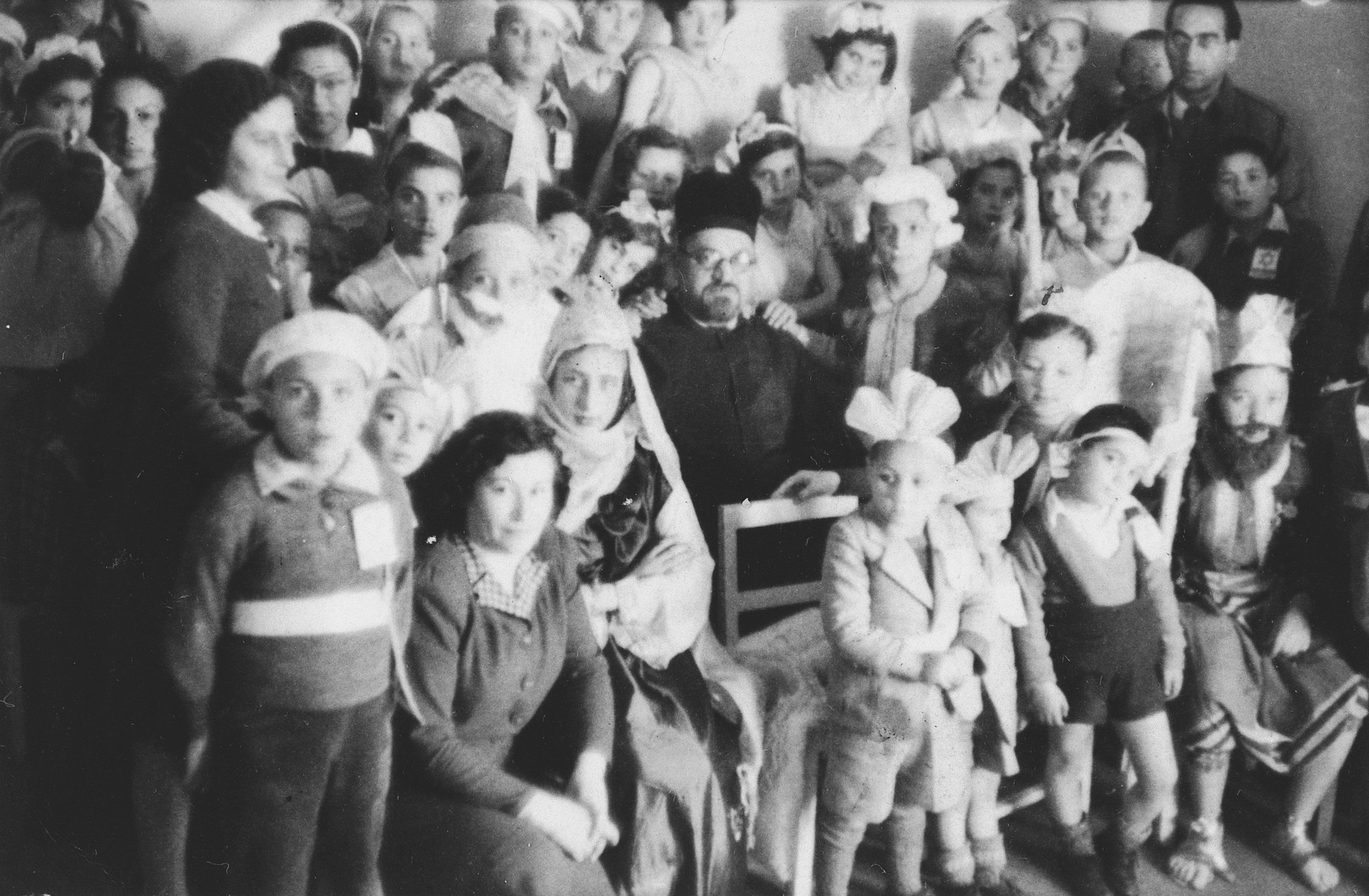 Children celebrate Purim in a Jewish orphanage in Greece.

Among those pictured is Katy Torres.