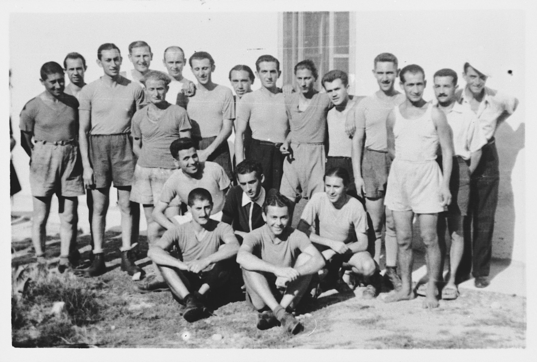 Group portrait of a soccer team in the Ferramonti camp.

This photograph was taken during a visit by Rabbi Pacifici to the internees.
