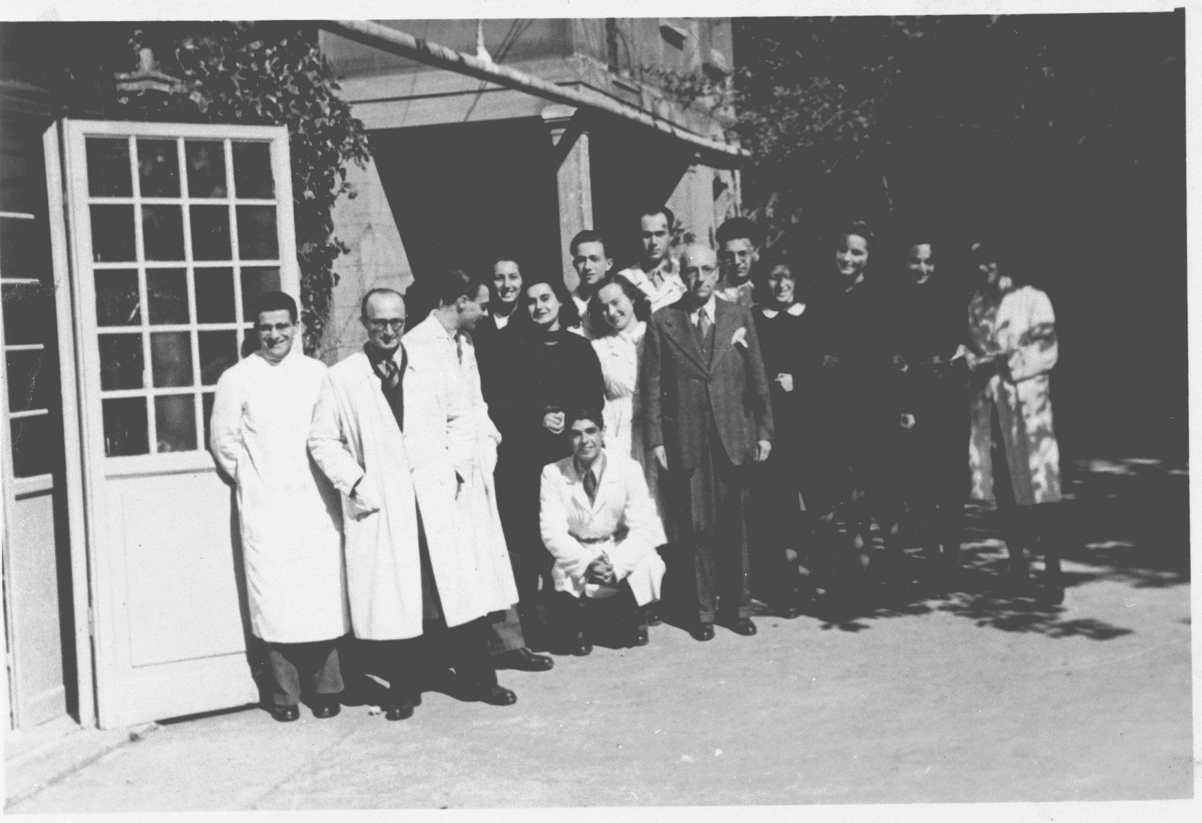 Students and faculty of the chemistry department of the Jewish high school in Milan stand in the school's courtyard.