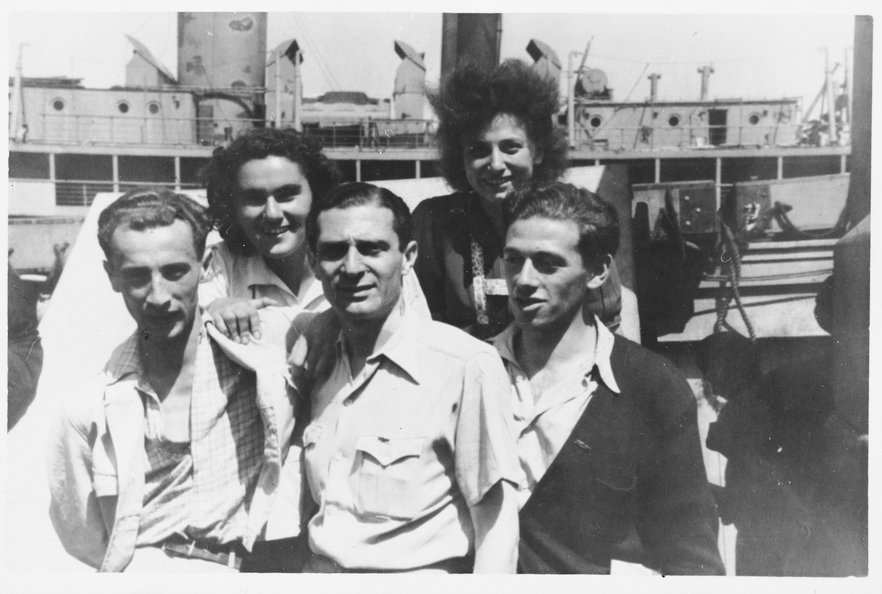 Group portrait of members of the Armée Juive French Jewish resistance at a reunion in Palestine in Kibbutz Sde Eliyahu.

Among those pictured is Simon Levitte, the head of Armée Juive (center).