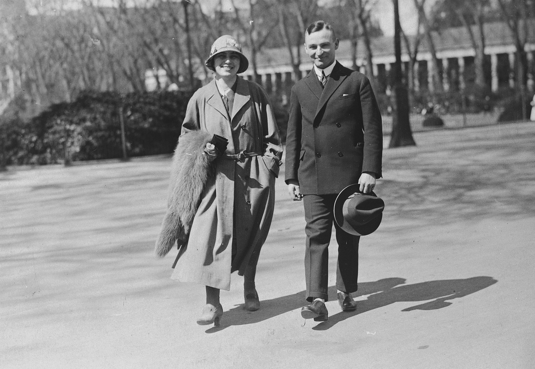 A German-Jewish couple walks down an open plaza in Wiesbaden, Germany.

Pictured are Julius and Grete Hermanns.