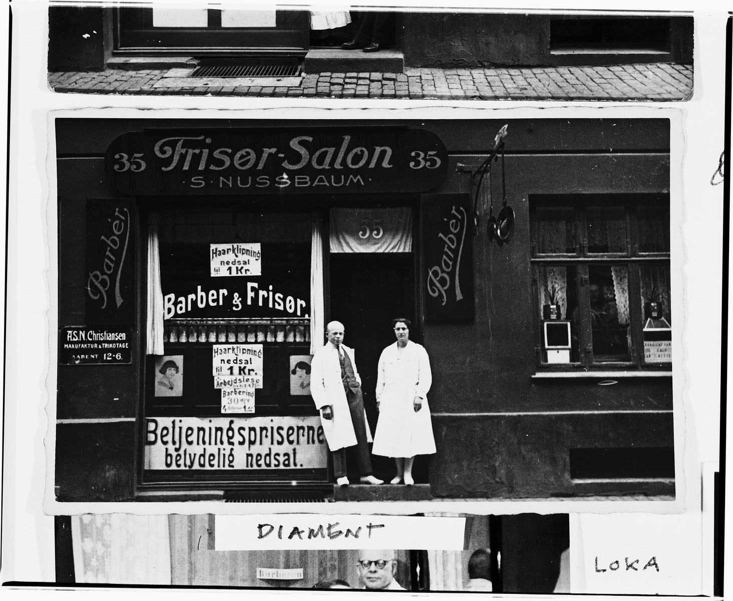 A Jewish couple poses in the doorway of their newly renovated barbershop located on the Ochenschlagergade in Copenhagen.

Pictured are Saul and Chane Nussbaum, who live in the same building.