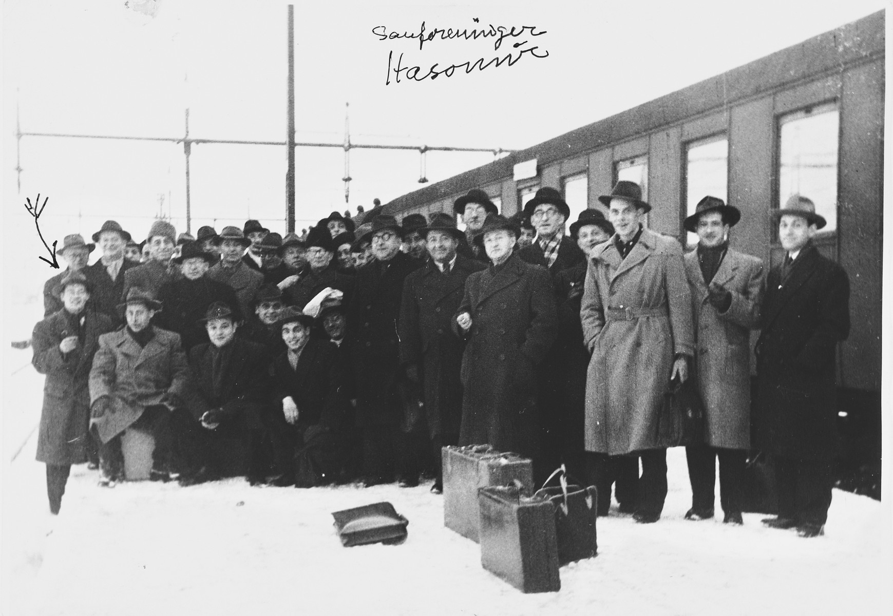 Group portrait of members of the Hasomir Jewish choir at the Hovedbanegarden train station in Copenhagen.

Among those pictured is Bernhard Diament (second from the left).