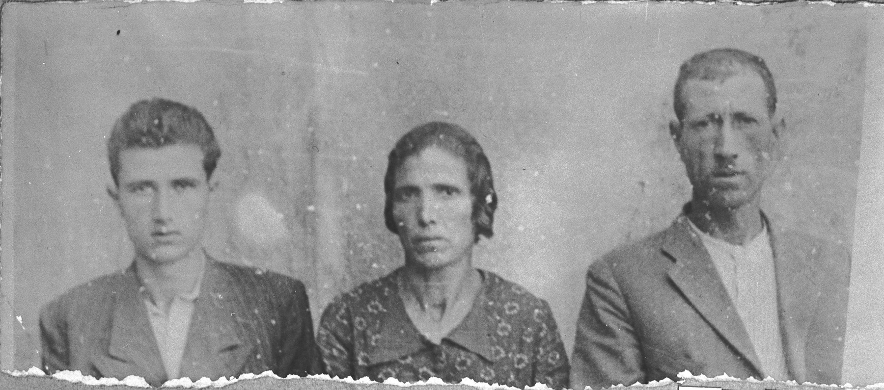 Portrait of Bohor Kamchi, son of Mushon Kamchi, Bohor's wife, Louisa, and his son, Mois.  Bohor was a plumber and Mois, a student.  The lived at Orisarska 7 in Bitola.