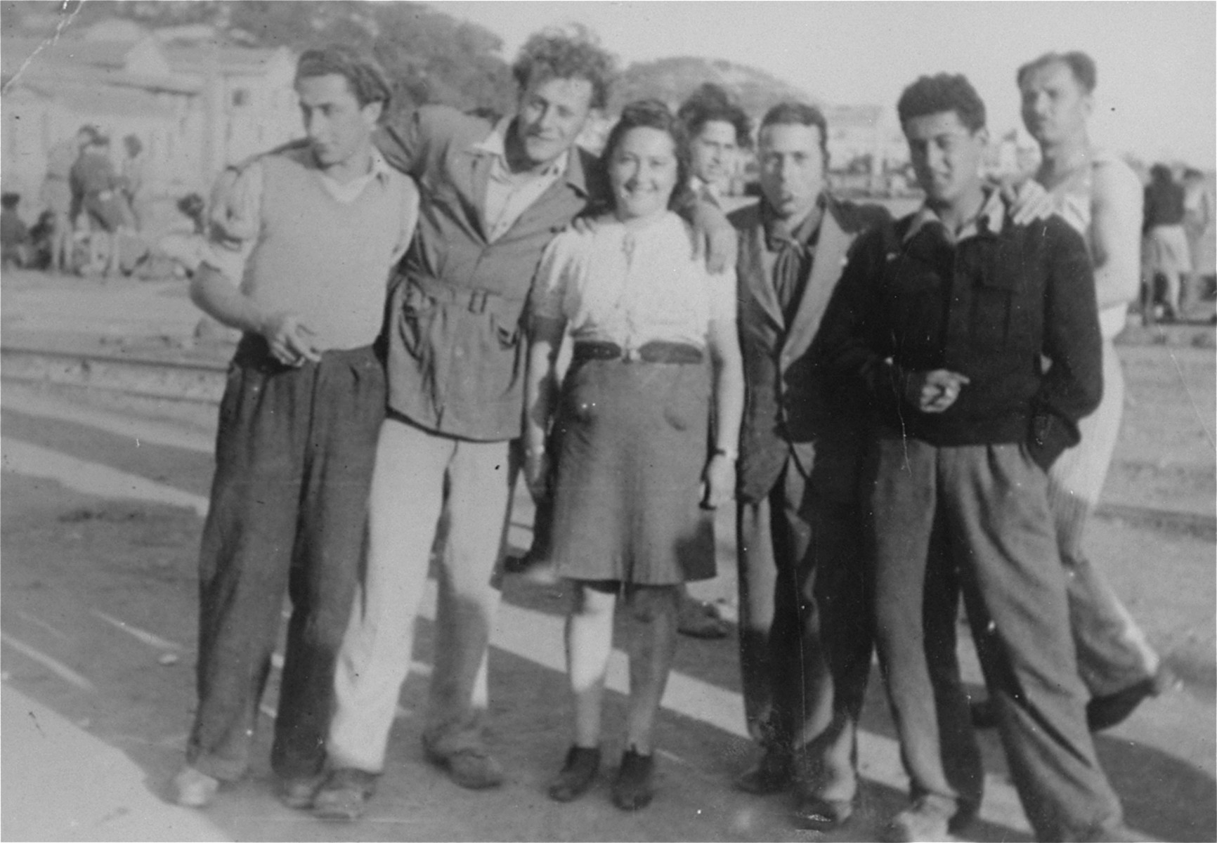 Hadasa Werdygier poses with a group of Italian Jews in La Spezia.  

The Italians are there to show support for the journey of the Eliahu Golomb to Palestine.