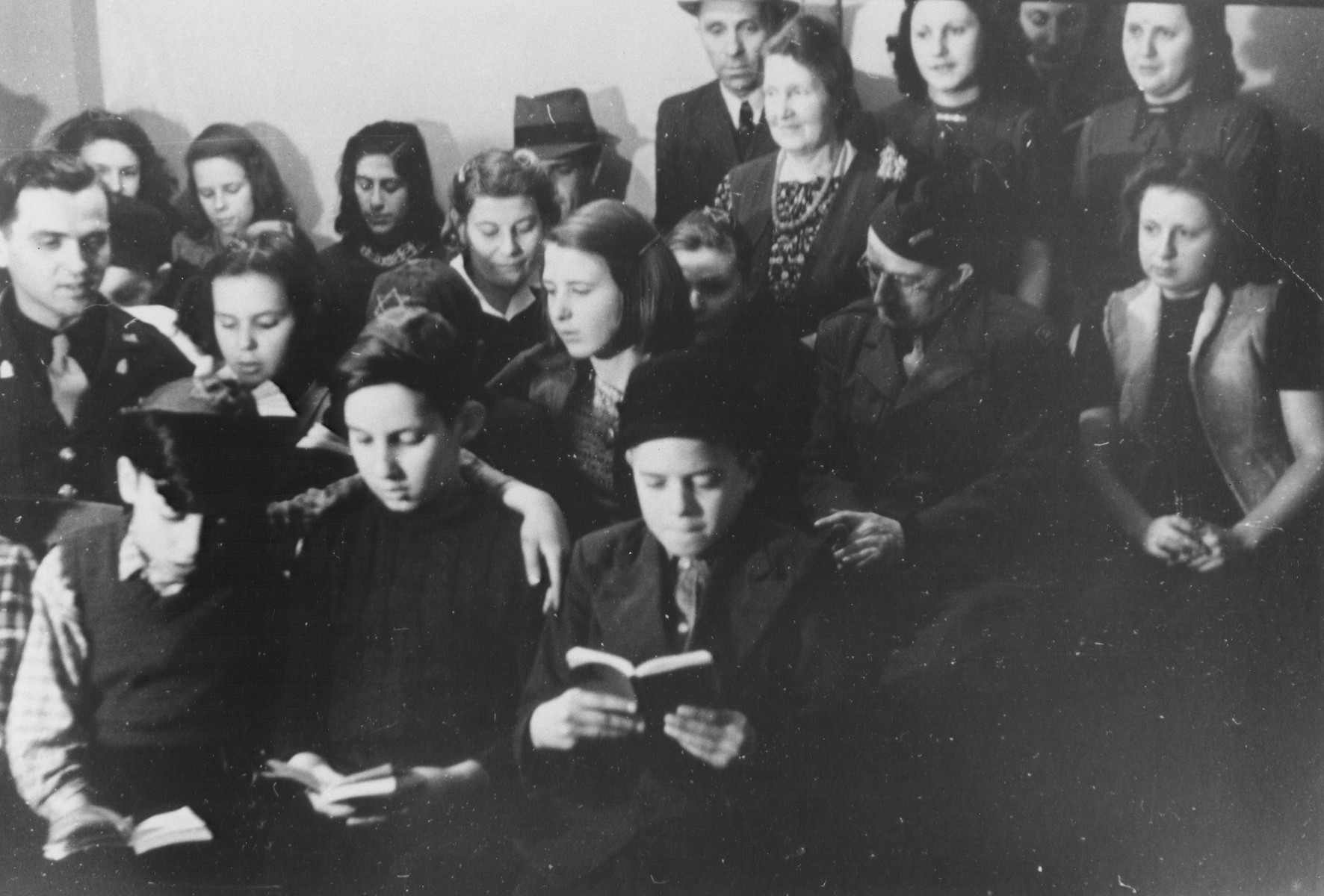 U.S. Army chaplain Rabbi Mayer Abramowitz assists students in the Jewish (Deutsche Juedische Jugend) school at the Berlin Chaplains' Center.

Abramowitz is pictured on the left in uniform.