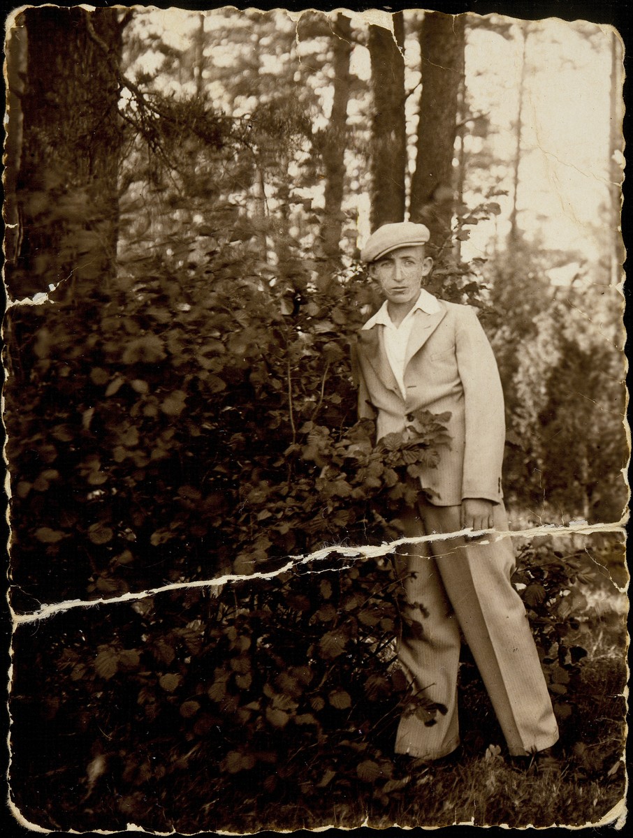 Portrait of Eliyahu Berkowicz in the forest near Eisiskes.

Eliyahu Berkowicz, the youngest of the six brothers, was denied a certificate to immigrate to Palestine, where he hoped to join his brothers.  He was killed by the Germans during the September 1941 mass shooting action in Eisiskes.