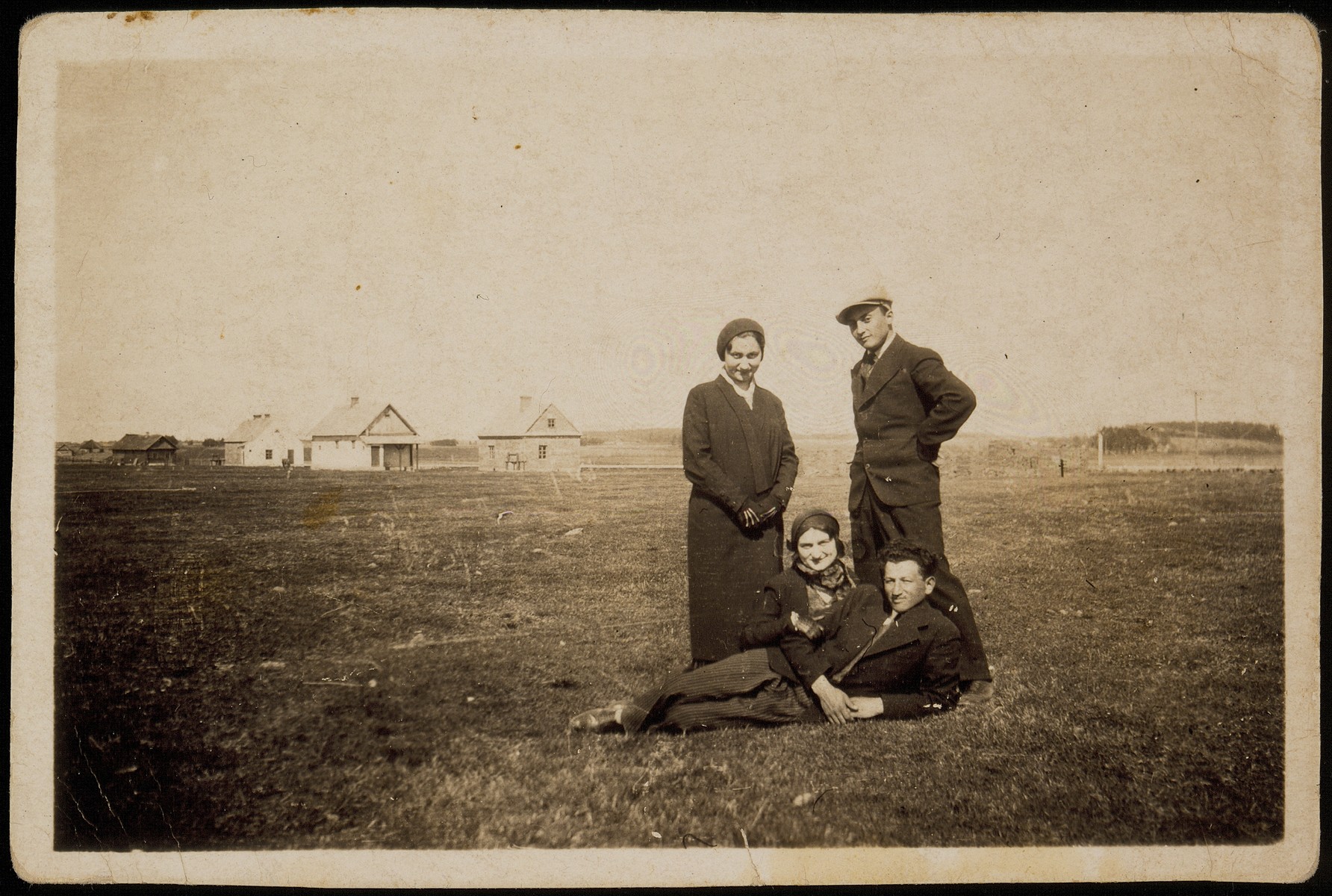 Members of the Sonenson family visit the shtetl Selo, a community for the insane. 

Sitting on the ground is Leibke  (Aryeh) Sonenson and his wife Geneshe.  Leibke  (Aryeh) Sonenson and his wife Geneshe and their son, Meir were killed by the Germans during the September 1941 mass shooting action in Eisiskes.