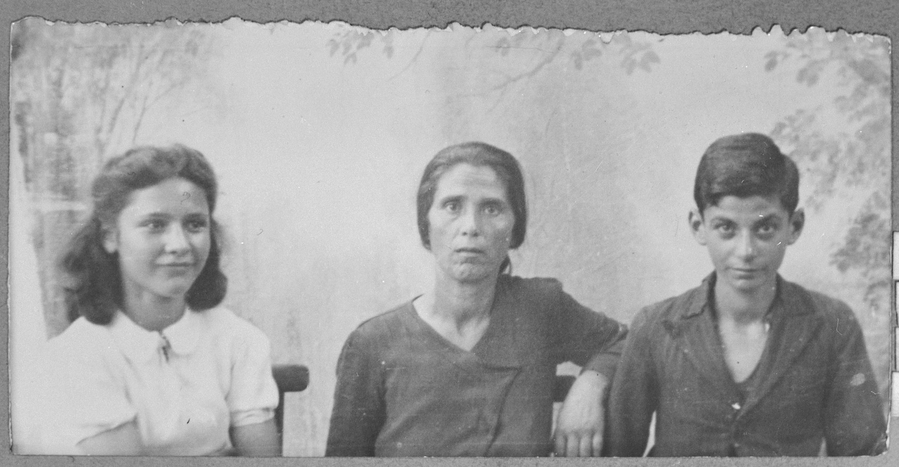 Portrait of Sara Todelano, wife of [Yakov Todelano], Reina Todelano, Yakov's daughter, and Anri Todelano, Yakov's son.  Reina and Anri were students.  They lived at Asadbegova 16 in Bitola.