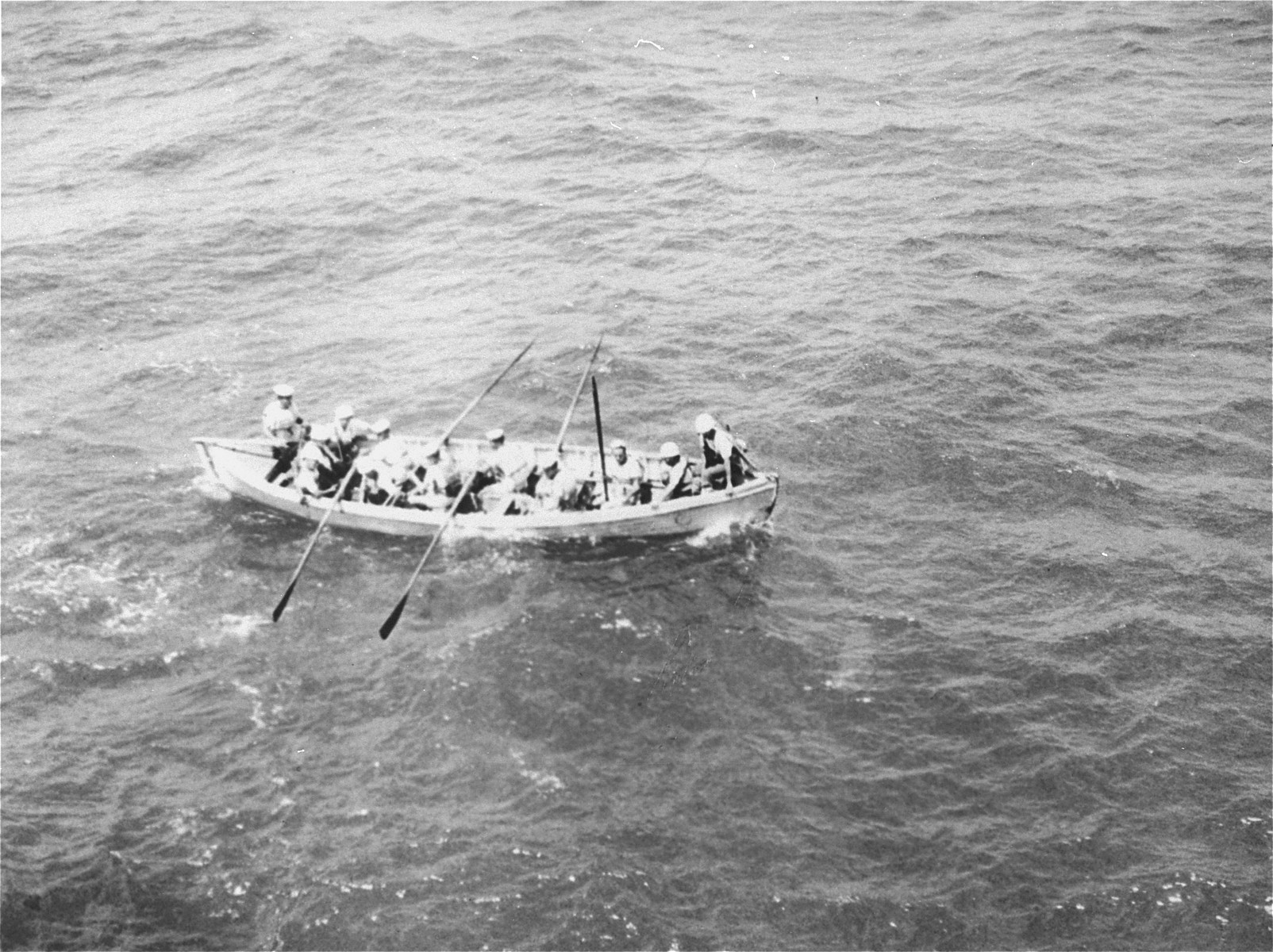 A boarding party from the British destroyer, H.M.S. Ajax, approaches the Exodus 1947.