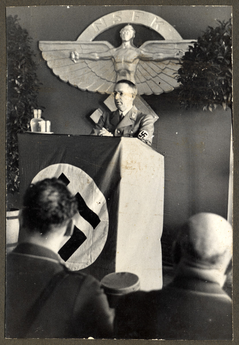Dr. Alfred Meyer, Gauleiter of Westfalen-Nord, speaks at an NSFK (Nationalsozialistisches Fliegerkorps, National Socialist Fliers Corps) speaks at a meeting in Borkenberge airfield.