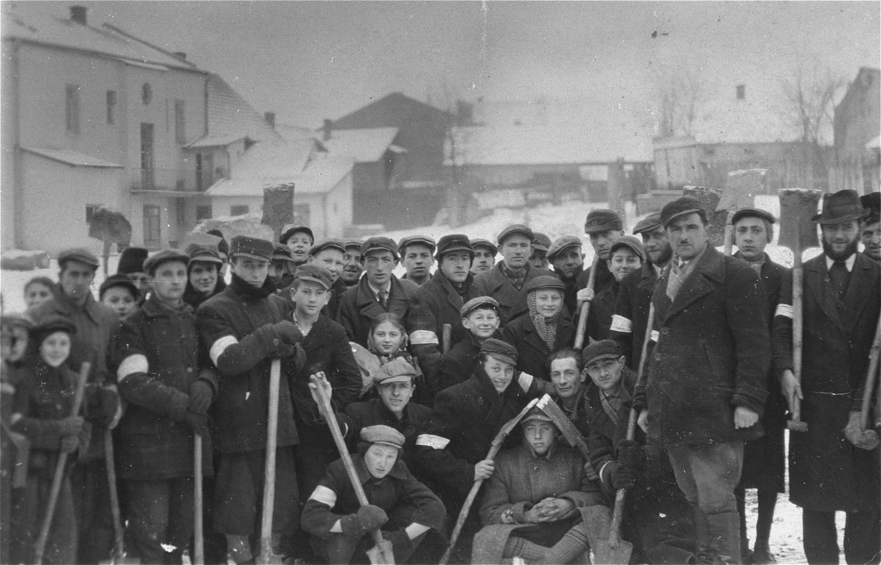 Group portrait of Jews at forced labor in the Kolbuszowa ghetto.
