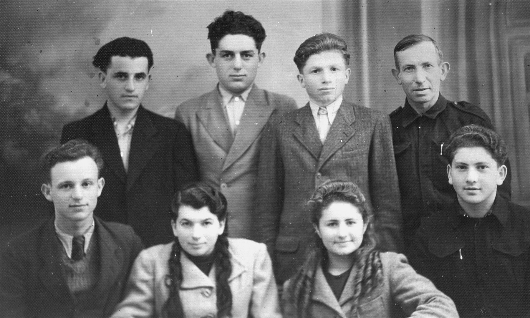 Group portrait of Jewish DP youth in Kolbuszowa.

Among those pictured is Manius Notowicz (front row, right) and Markus Rohtbart (top row, right).