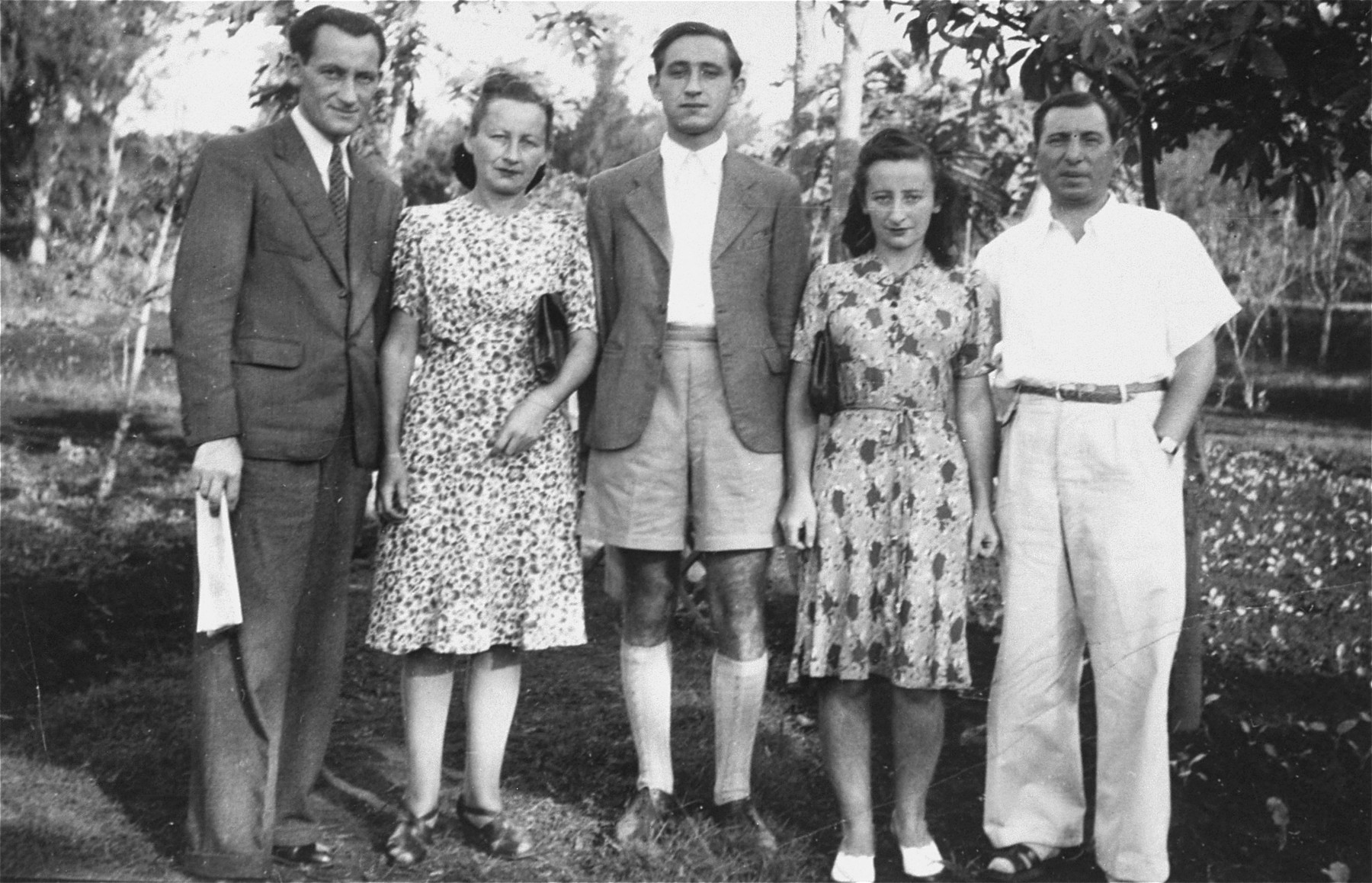 Group portrait of members of the Makowski family from Danzig during their internment on the island of Mauritius.

Pictured from left to right are: Israel Makowski, Fela and Hersh Makowski, Genia (Makowski) Less, and her husband, Beno Less.