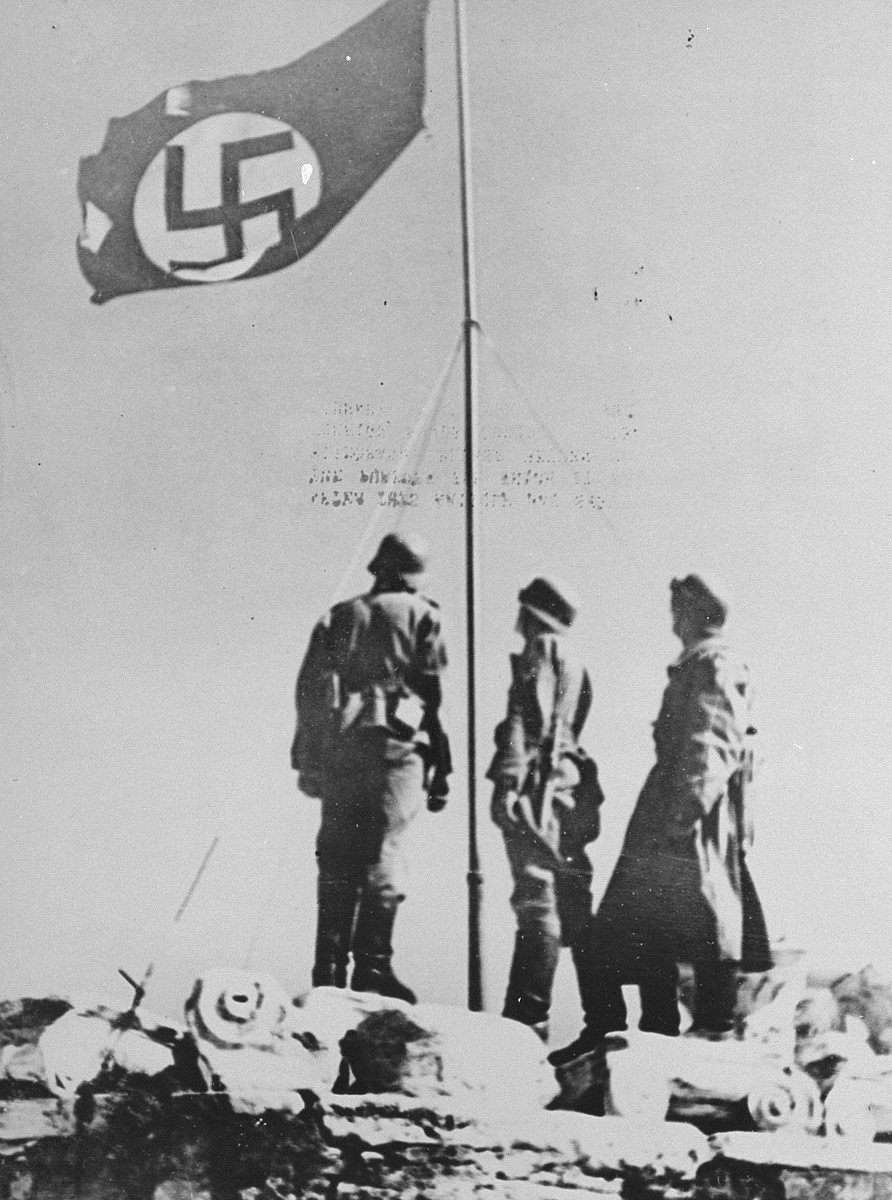 German troops raise the Nazi flag over the Acropolis.
