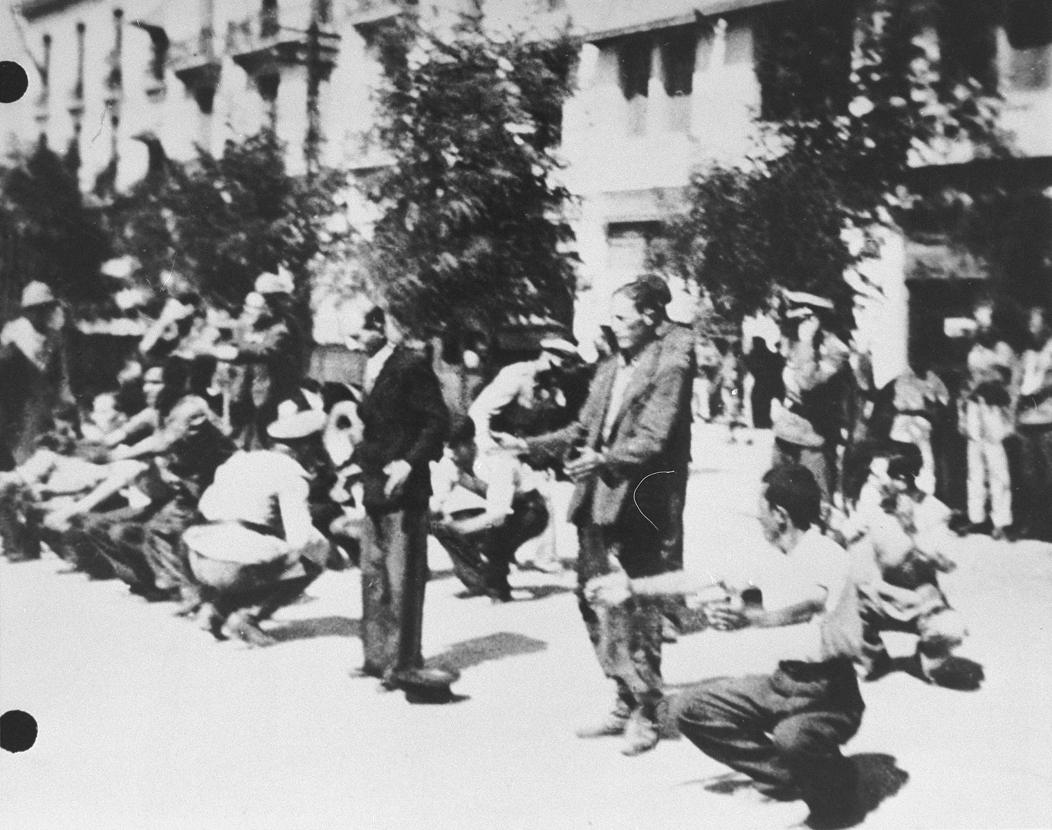 German soldiers force Jews assembled on Eleftheria (Freedom) Square to perform calisthenics.