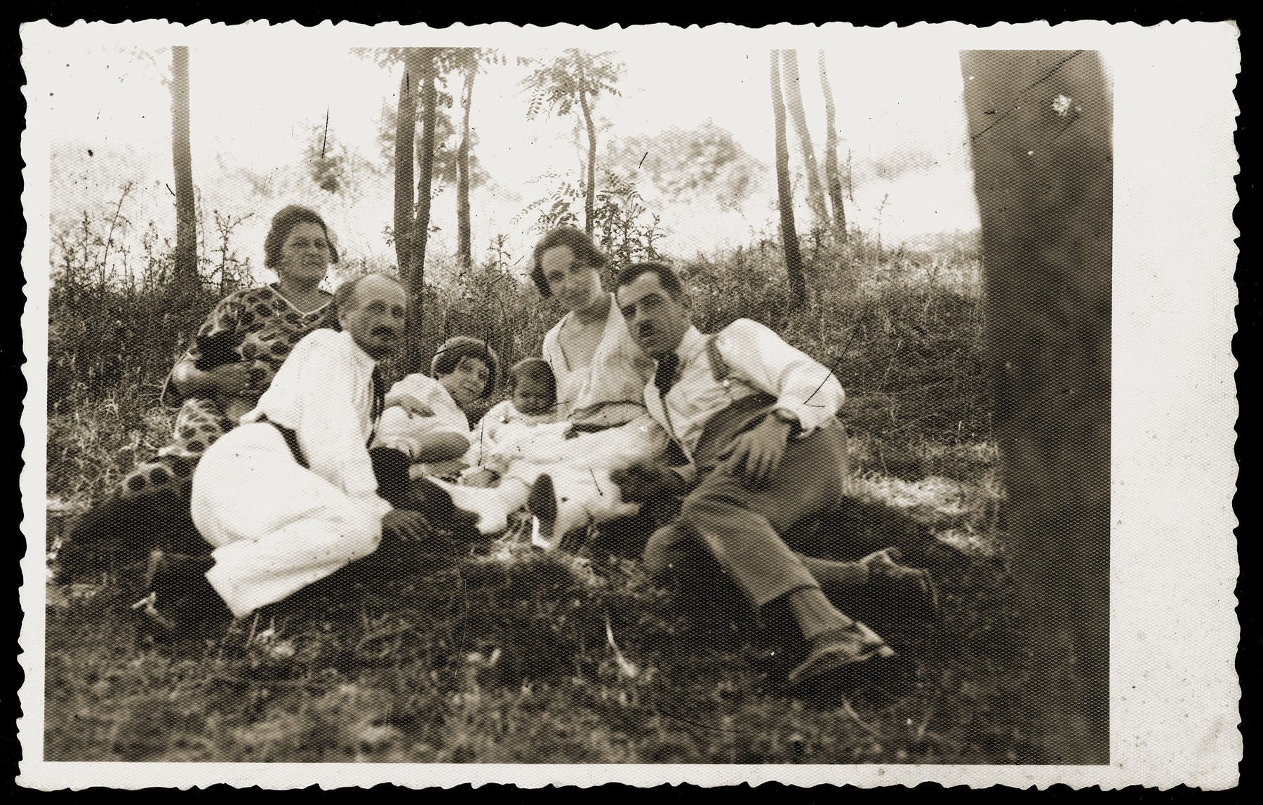 The family of Gavra Konfino on an outing in Belgrade.

From right to left are Gavra, Elizabeth, Gizella and Gabriela (Ella) Konfino and an unidentified couple.