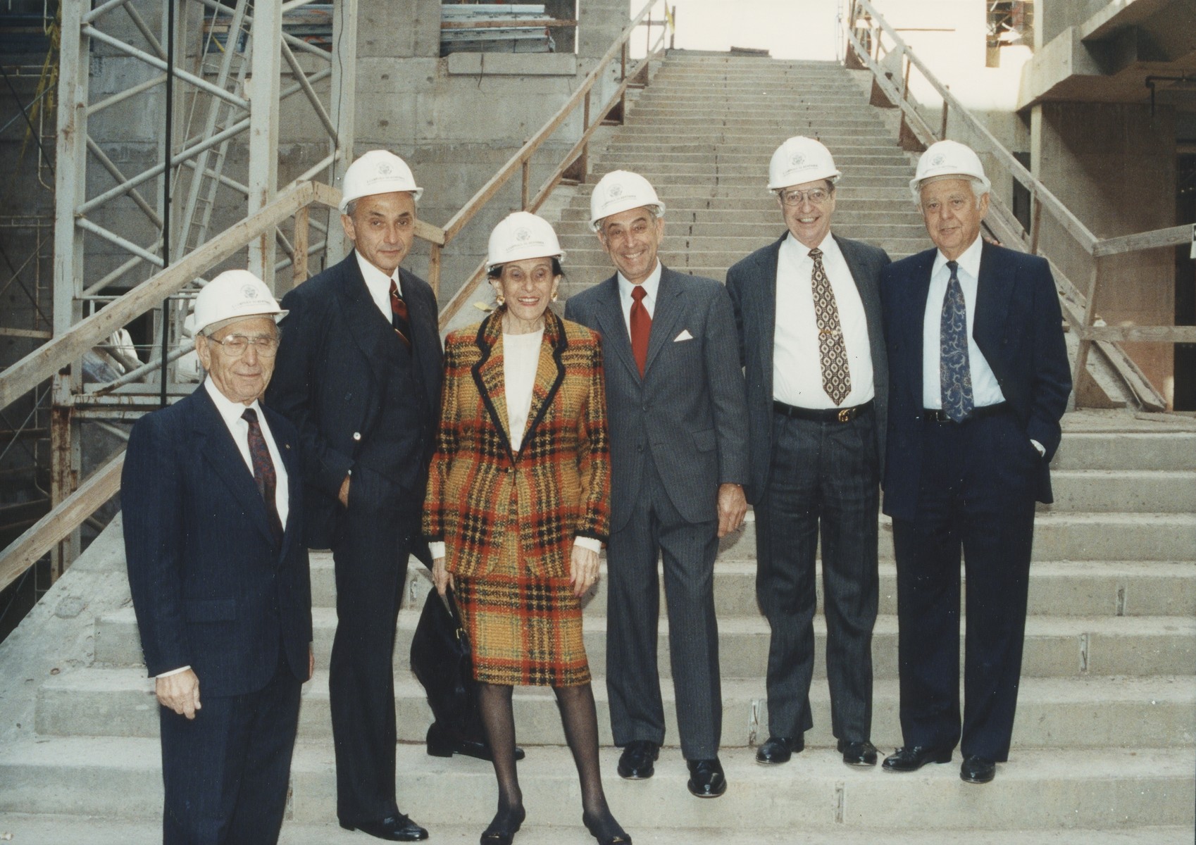Standing before the grand staircase in the unfinished Hall of Witness are, from left, National Campaign Chairman Miles Lerman; Leslie Wexner; his mother, Bella Wexner; Council Chairman Harvey M. Meyerhoff; Albert Ratner; and Albert (Sonny) Abramson. The Wexner Family donated $5 million to underwrite the Learning Center on September 20, 1991.