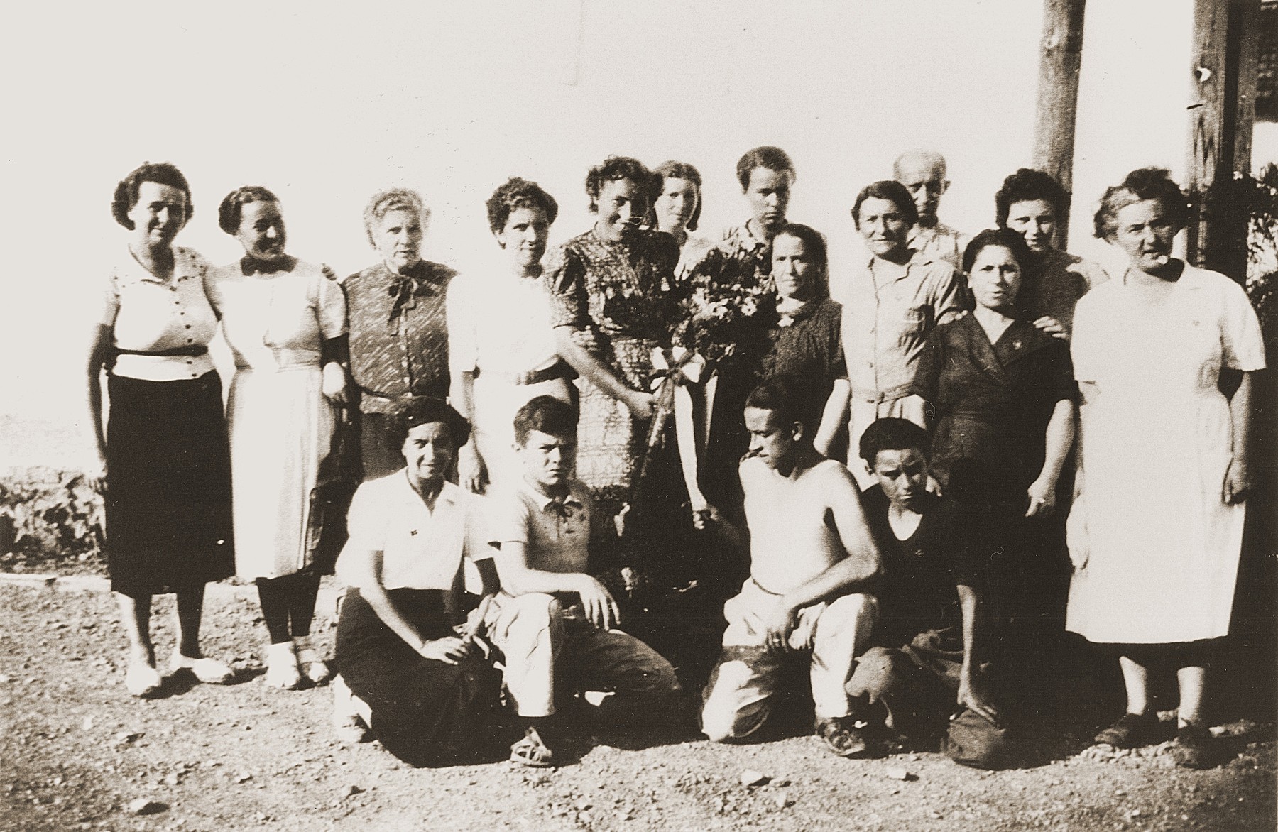 Group portrait of Spanish and Jewish assistants to the Secours Suisse relief team.  They gathered to mark the departure of Elsa Ruth.