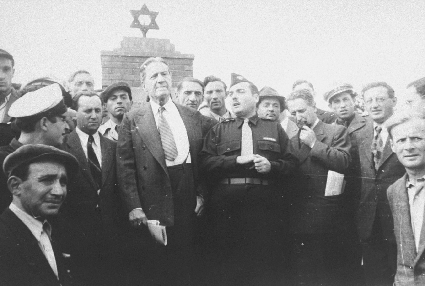 Rabbi Stephen Wise visits the Zeilsheim displaced persons camp. 

Among those pictured is Abe Greenberg (far right, front).