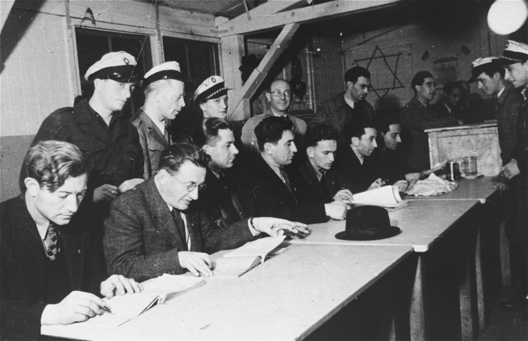 Jewish police supervise the work of the electing committee during elections in the Zeilsheim displaced persons' camp.