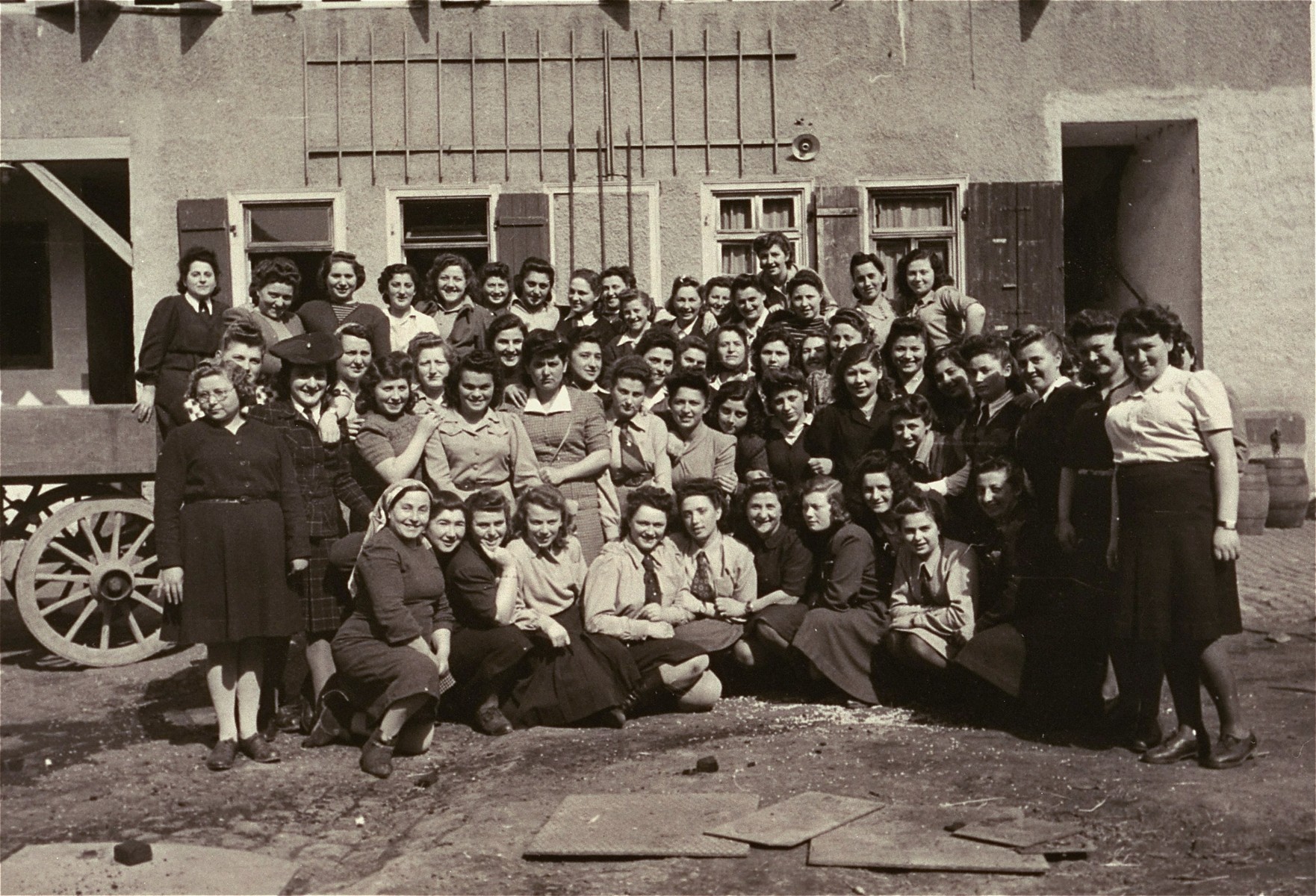 Group portrait of members of the hachshara kibbutz [agricultural training farm] "Kibbutz Negev" in the Zeilsheim displaced person's camp.
