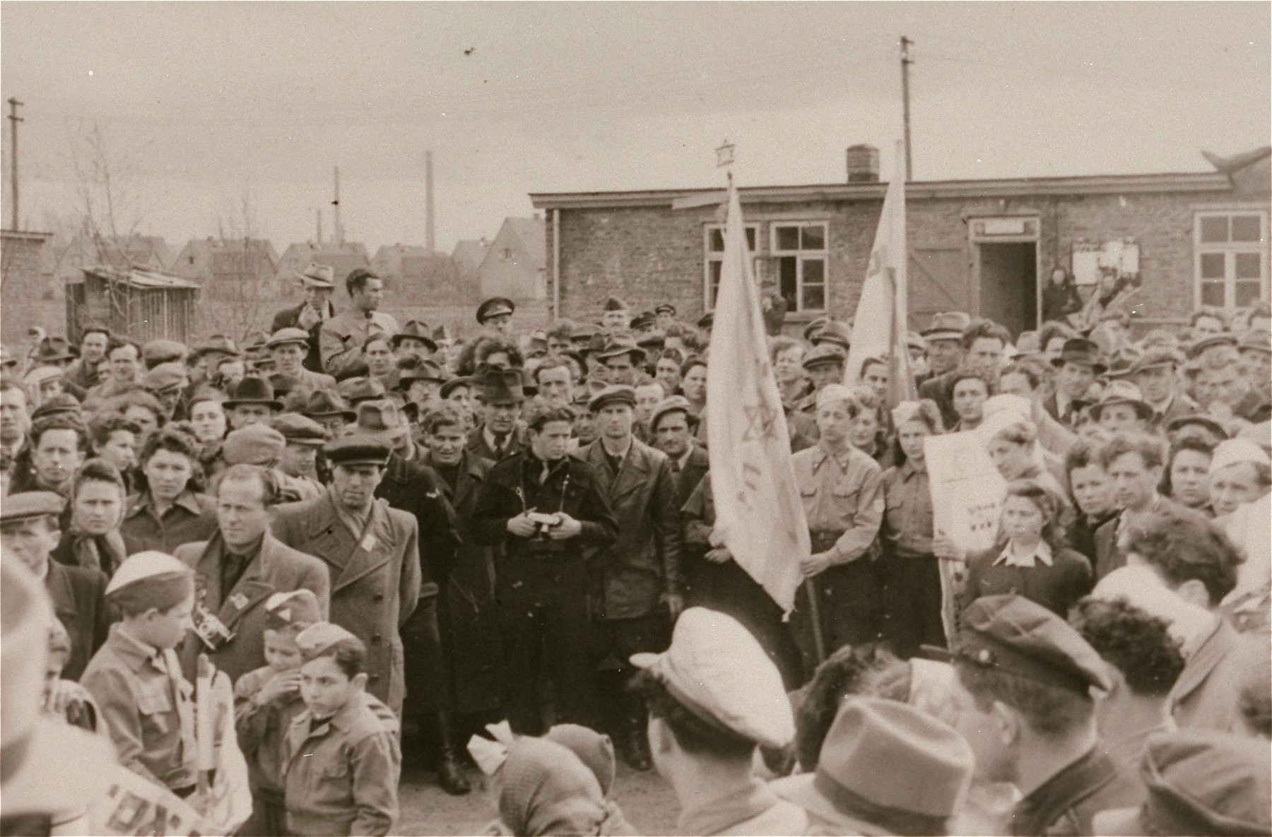 Jewish DPs at the Zeilsheim displaced persons camp hold a rally to promote free immigration to Palestine.