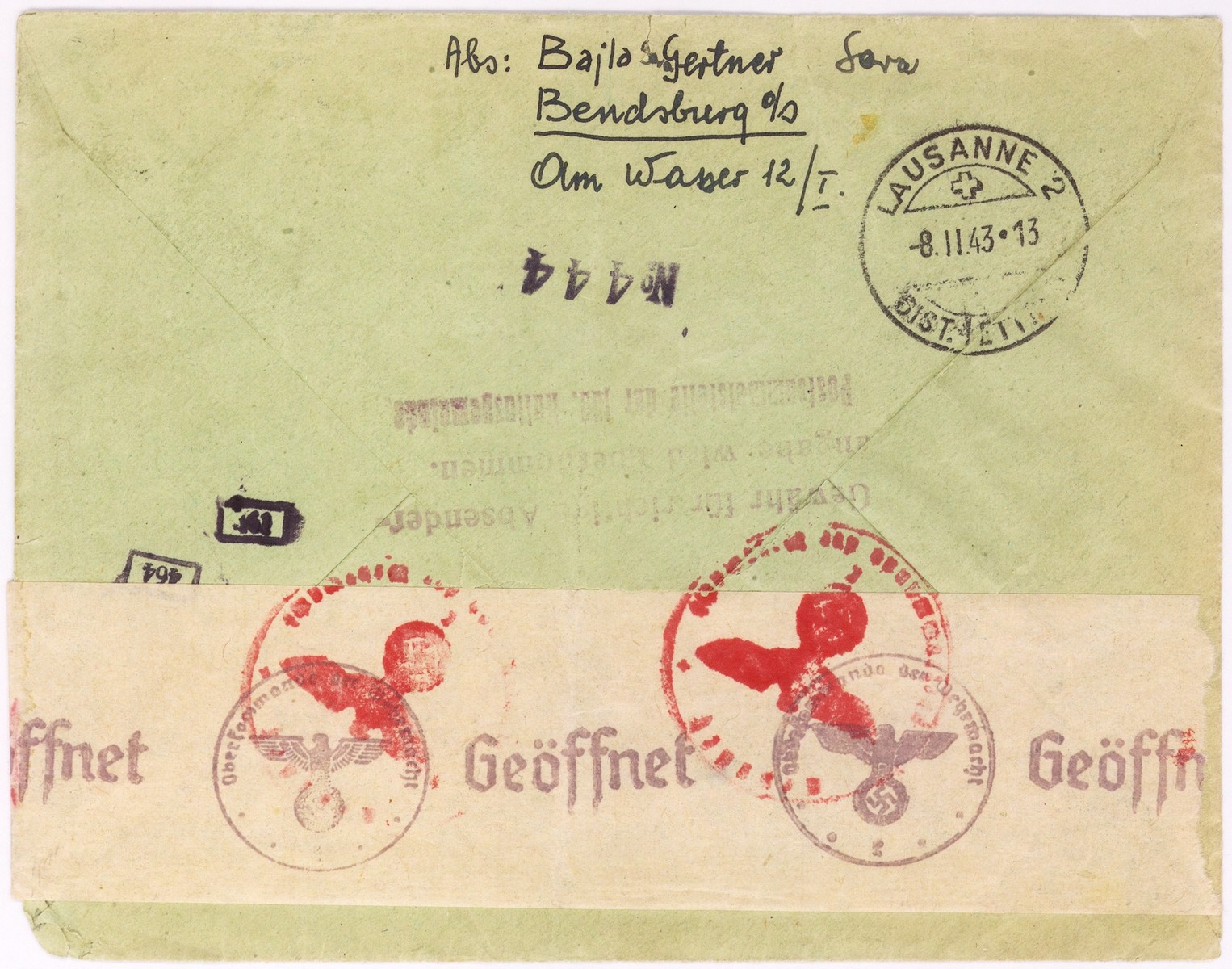An envelope of a registered letter sent from  Dabrowa  by Bajla Gertner to Alfred Schwartzbaum in Lausanne, Switzerland.  The return address of the sender or senders states:  Bendsburg, Am Wasser 12/I.  On the back of the envelope there is a piece of tape with a stamp of the German censor.