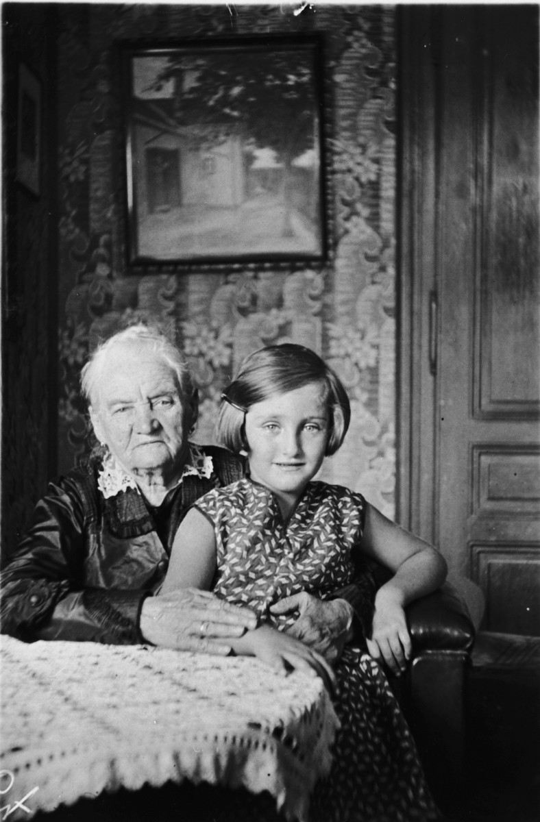 Ilse Morgenstern poses on her grandmother's lap inside their home in Vienna.