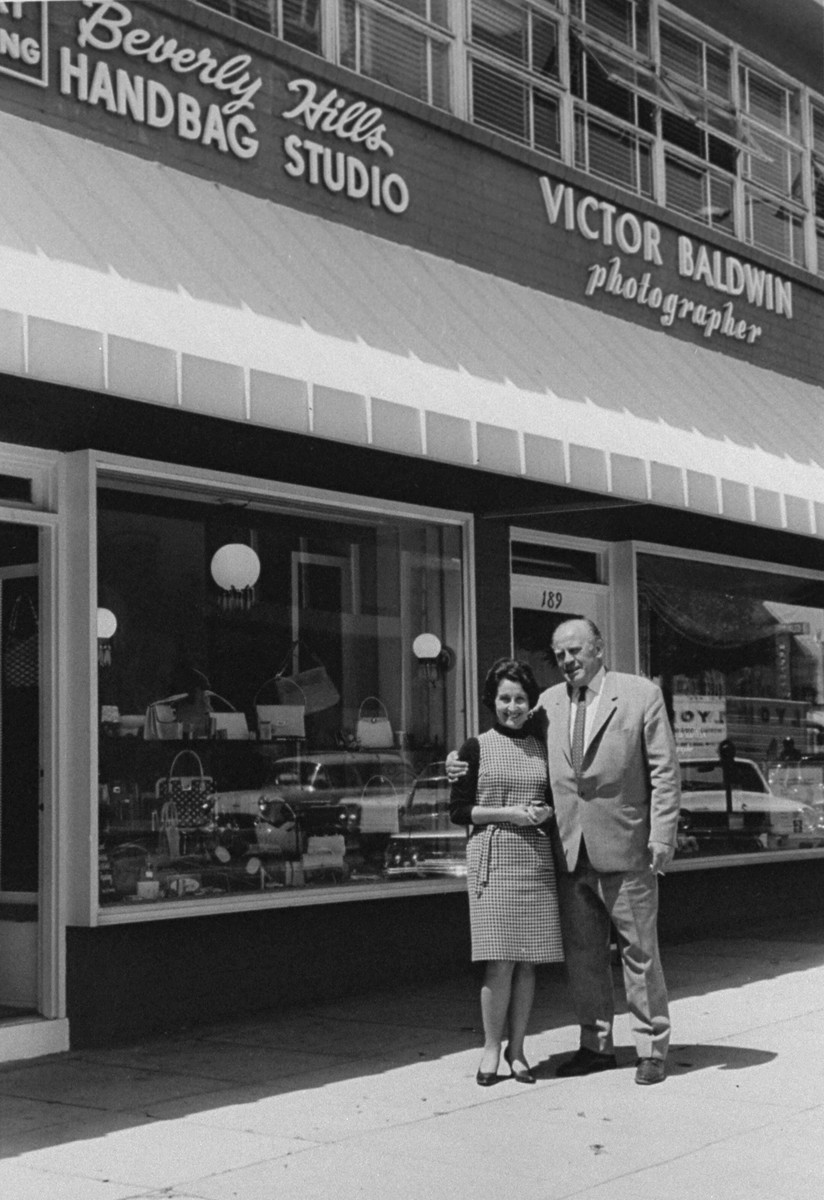 Oskar Schindler and Ludmila Pfefferberg-Page who was saved by him, in front of her store in Beverly Hills.