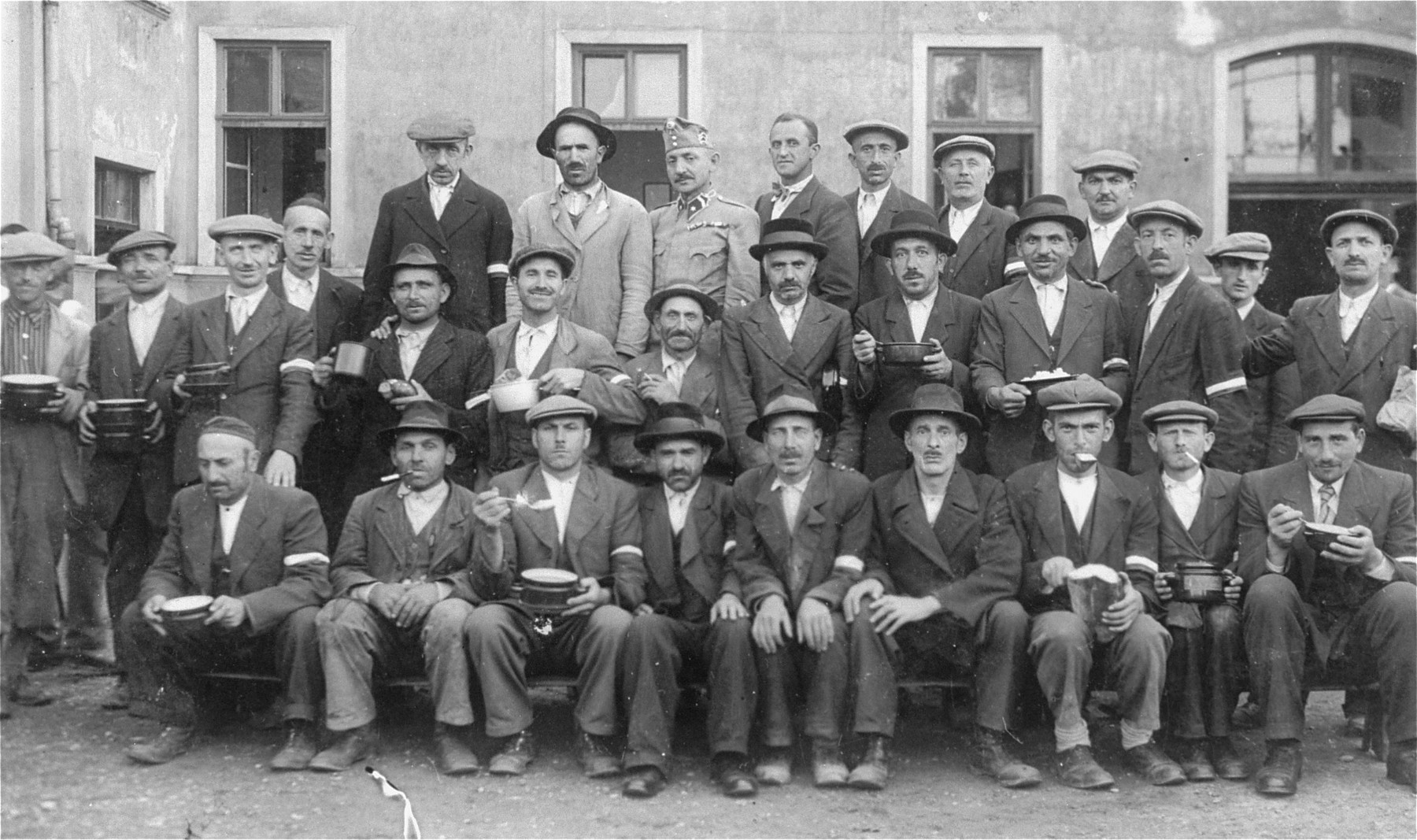 Group portrait of members of an Hungarian Jewish labor battalion in Mukachevo. 

Few of these men survived the war.
