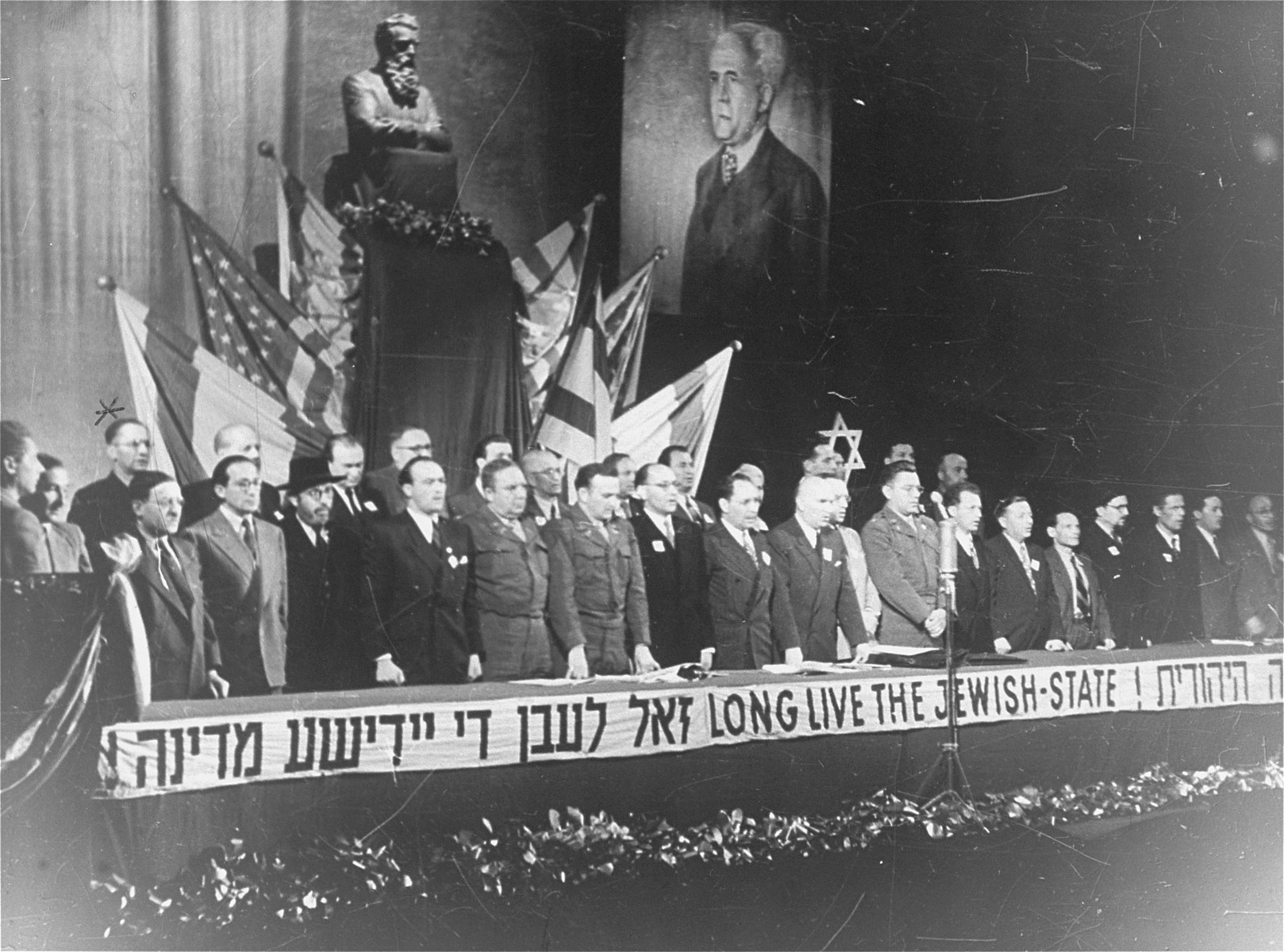 A meeting of the Central Committee of Liberated Jews in the US Zone of Germany celebrating the establishment of the State of Israel.