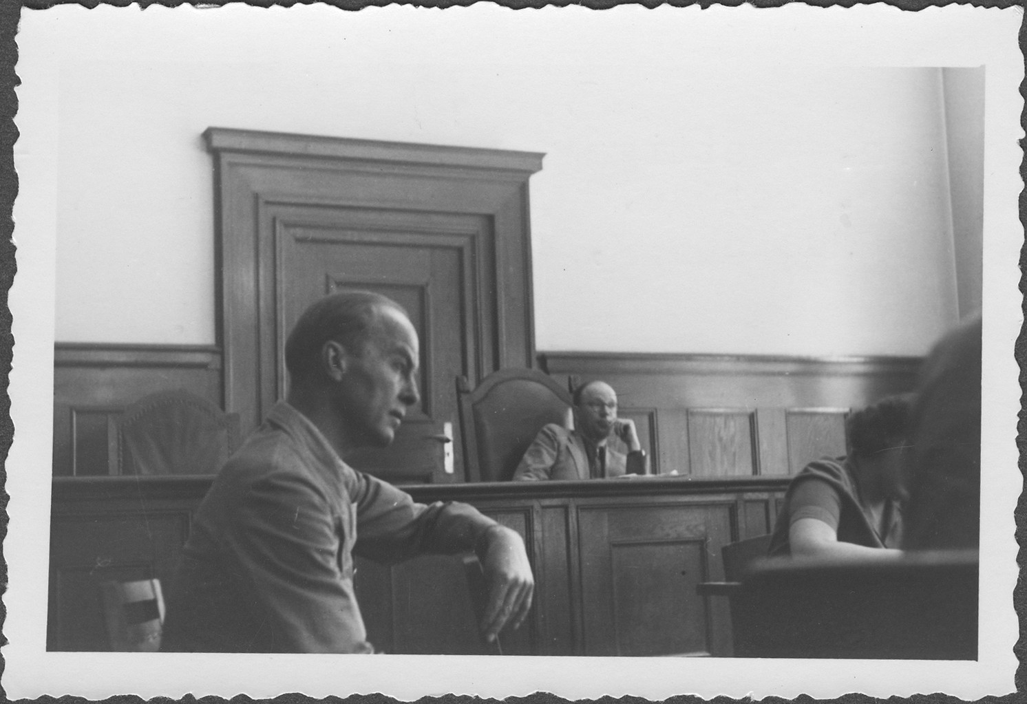 Interrogation of General Roettiger before Commissioner Rasumov at the IMT Nuremberg commission hearings investigating indicted Nazi organizations.