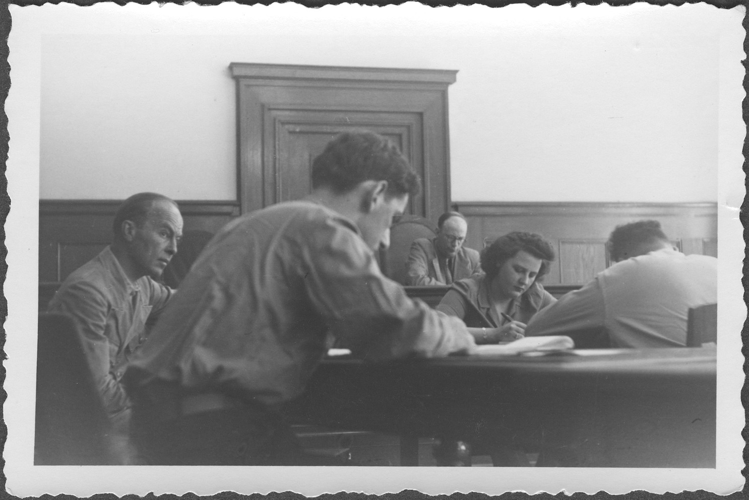 Interrogation of General Roettiger before Commissioner Rasumov at the IMT Nuremberg commission hearings investigating indicted Nazi organizations.