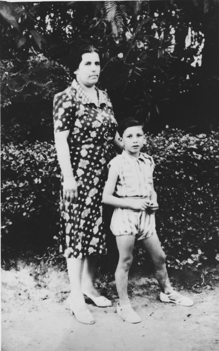 Sarah (Kolonomos) Nehama poses with her son Nehama Nehama in a park in Athens.