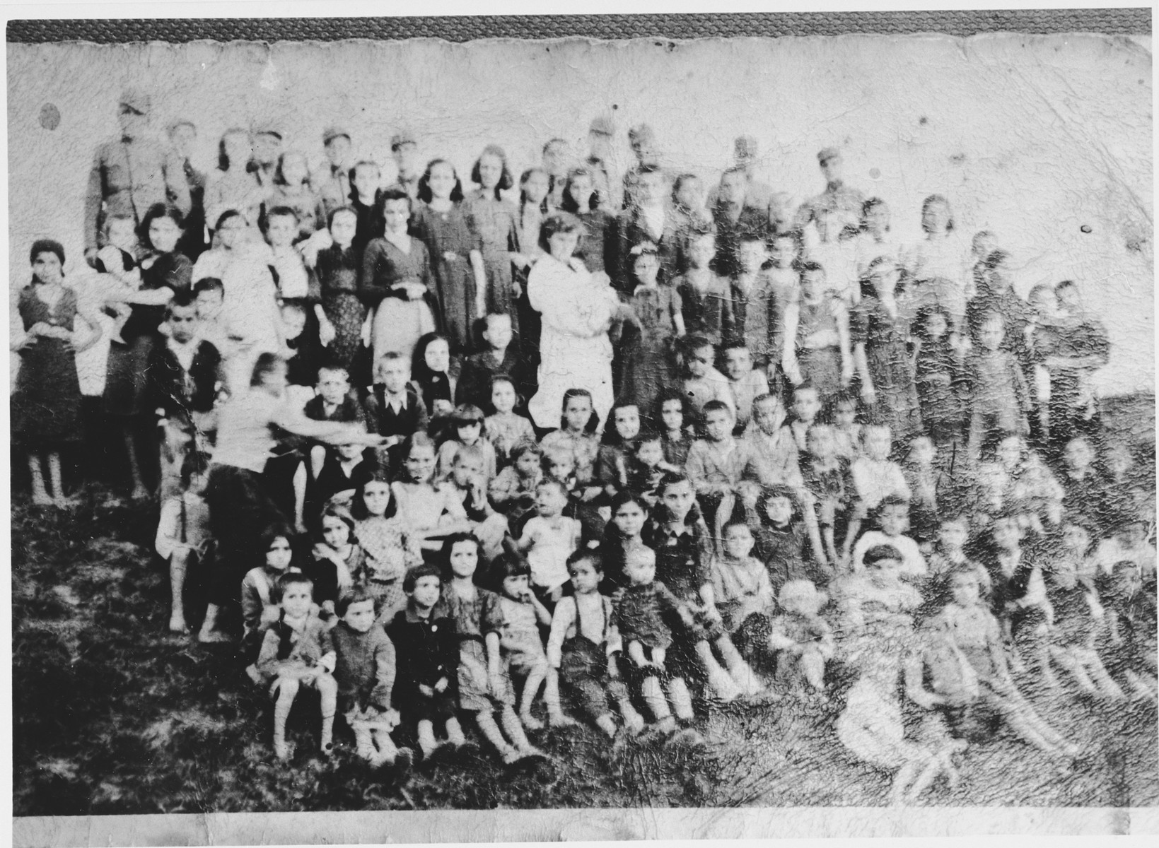 Group portrait of women and children in the Pecana camp in Sisak (near the village of Goldovo).

Most of the children are from the Serbian village of Gornje Dubrave in the district of Ogulin.