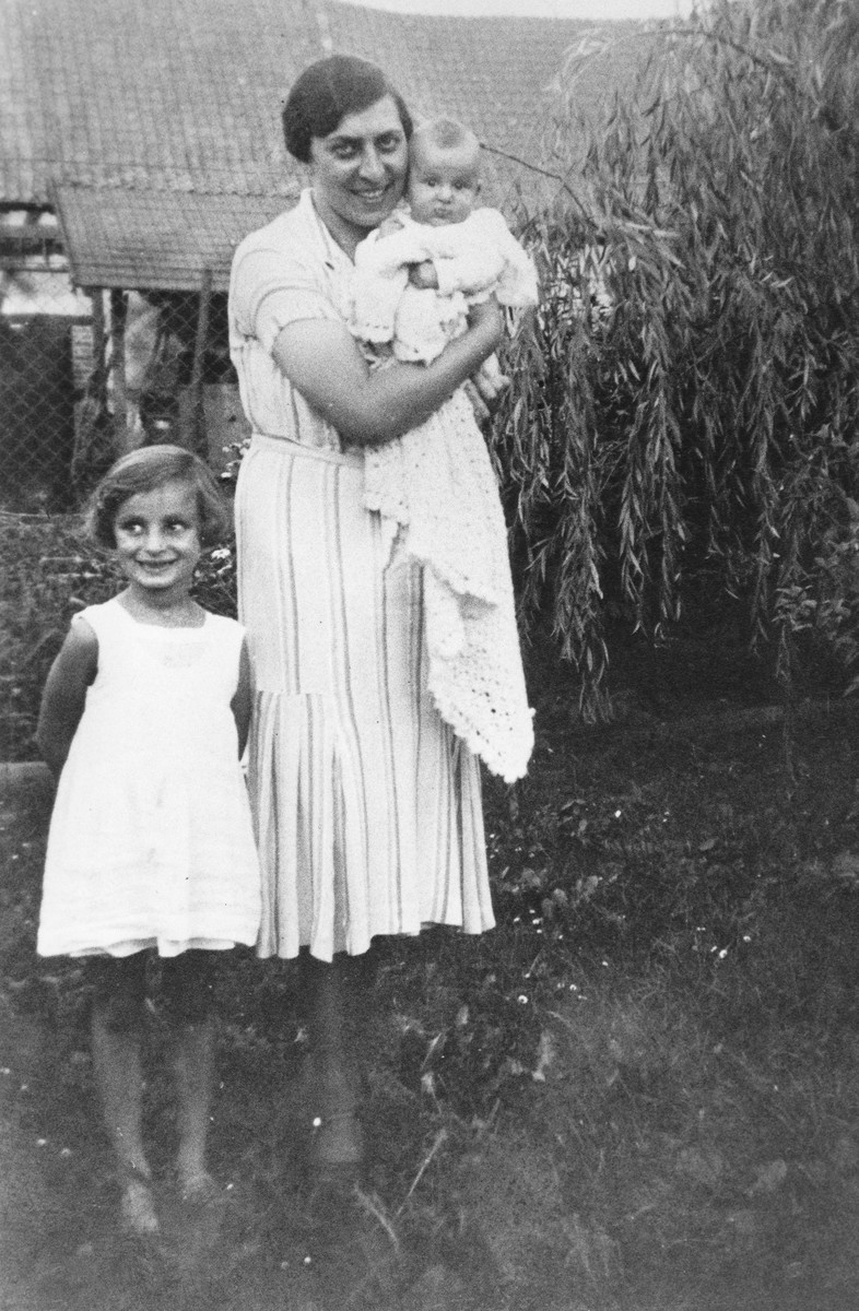 Sara Berg poses with her nieces, Inge and Gisela Berg, on the family farm in Lechenich, Germany.