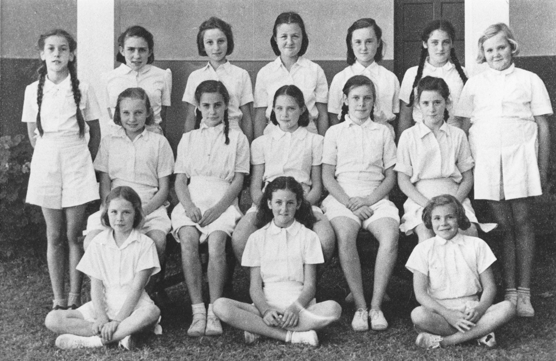 Group portrait of students in the British school in Nairobi, Kenya.

Gisela Berg (top row, third from the left) was one of the only Jewish students in the school.