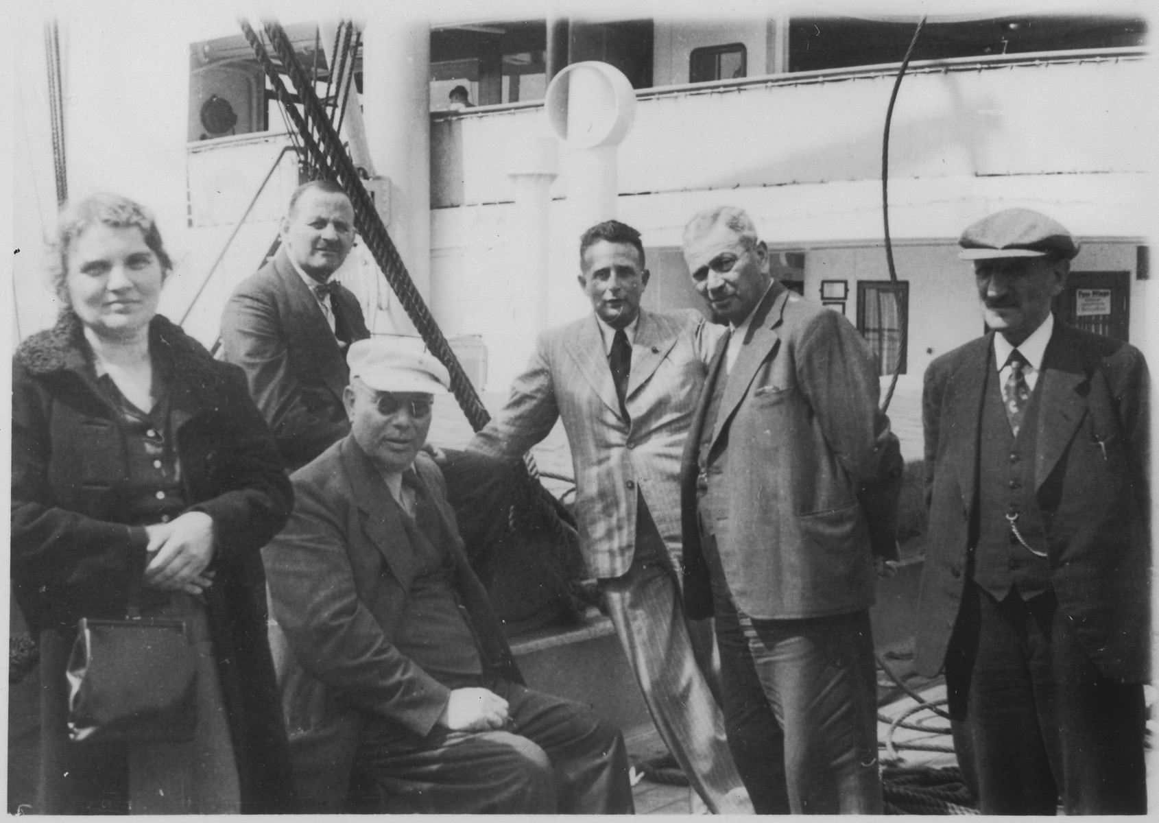 A group of pasengers gathers on the deck of the St. Louis.